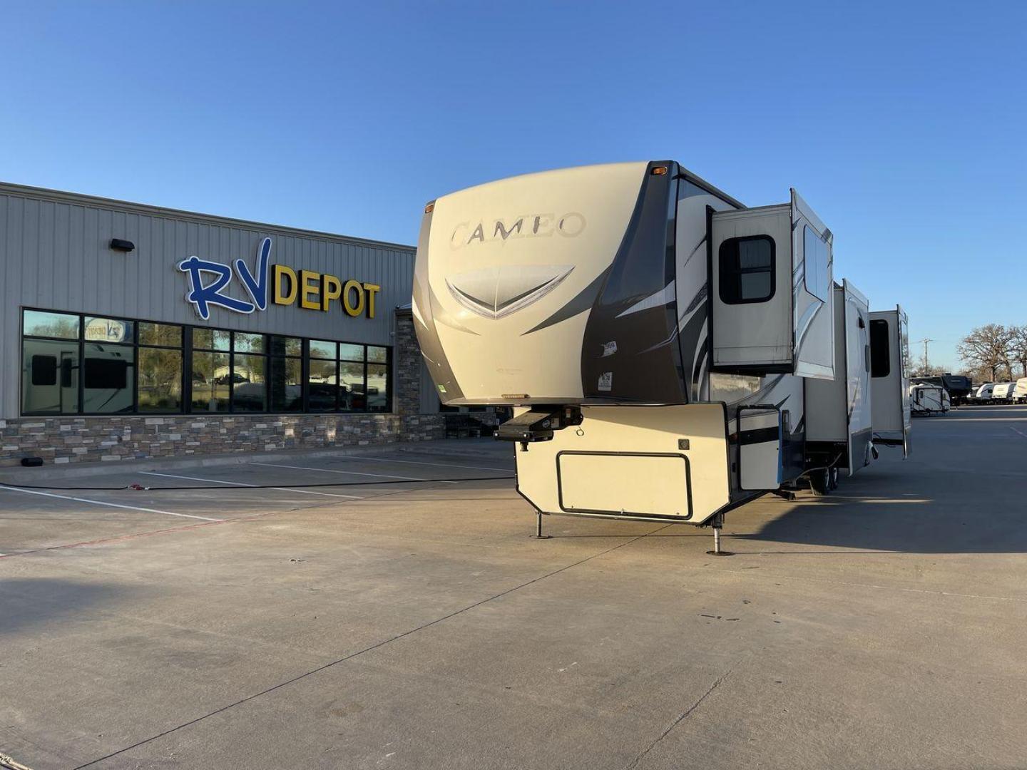 2017 TAN CAMEO 3701RD (4V0FC3727HR) , Length: 42.08 ft. | Dry Weight: 13,848 lbs. | Gross Weight: 16,678 lbs. | Slides: 5 transmission, located at 4319 N Main St, Cleburne, TX, 76033, (817) 678-5133, 32.385960, -97.391212 - At 42.08 feet in length and boasting five slideouts, the Cameo 3701RD is a masterclass in RV luxury that beckons you to embark on a journey where every mile is marked by comfort, style, and unparalleled sophistication. Crafted by CrossRoads RV, the Cameo series is celebrated for its unparalleled cra - Photo#0