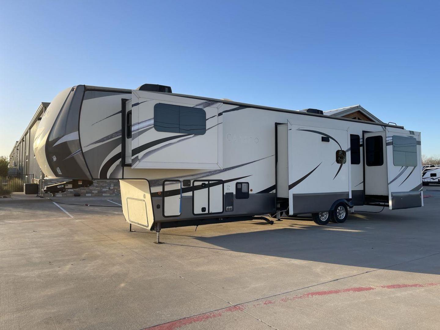 2017 TAN CAMEO 3701RD (4V0FC3727HR) , Length: 42.08 ft. | Dry Weight: 13,848 lbs. | Gross Weight: 16,678 lbs. | Slides: 5 transmission, located at 4319 N Main St, Cleburne, TX, 76033, (817) 678-5133, 32.385960, -97.391212 - At 42.08 feet in length and boasting five slideouts, the Cameo 3701RD is a masterclass in RV luxury that beckons you to embark on a journey where every mile is marked by comfort, style, and unparalleled sophistication. Crafted by CrossRoads RV, the Cameo series is celebrated for its unparalleled cra - Photo#24