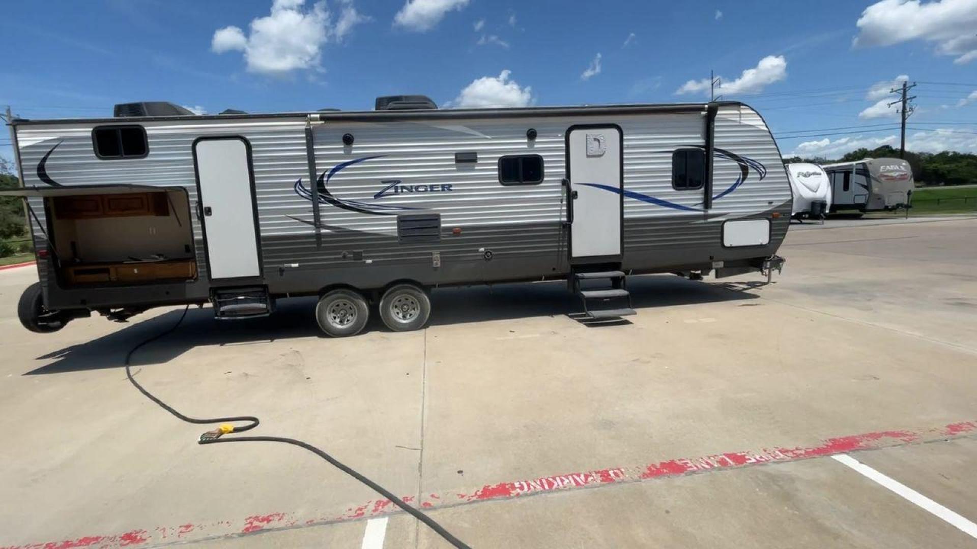 2017 CROSSROADS RV ZINGER 33SB (4V0TC3329HJ) , Length: 37.17 ft.| Dry Weight: 8,298 lbs. | Gross Weight: 9,900 lbs | Slides: 2 transmission, located at 4319 N Main St, Cleburne, TX, 76033, (817) 678-5133, 32.385960, -97.391212 - Photo#2