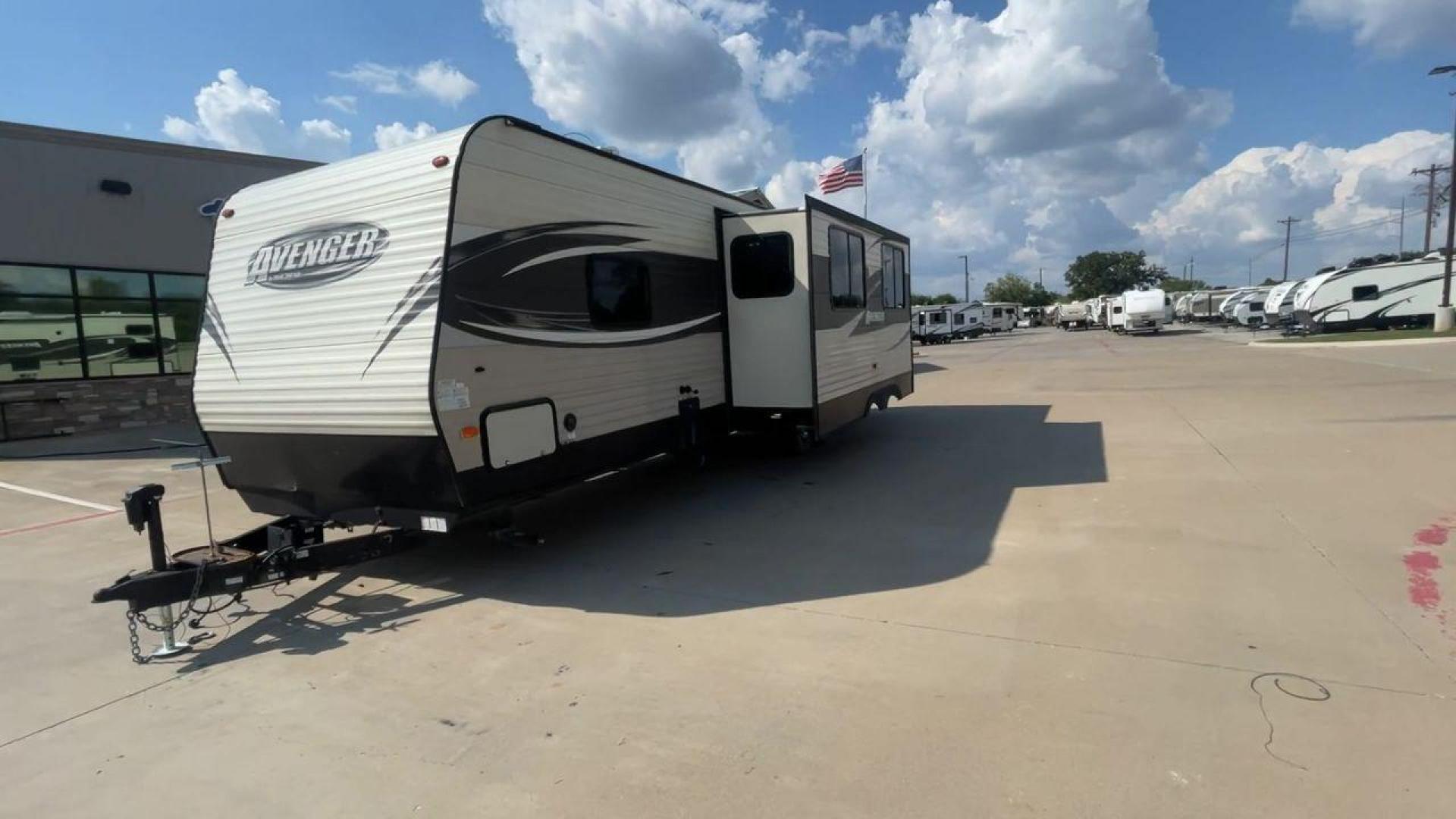 2017 TAN FOREST RIVER AVENGER 31DBS (5ZT2AVWB1HB) , Length: 35.75 ft | Dry Weight: 7,189 lbs. | Gross Weight: 9,589 lbs. | Slides: 1 transmission, located at 4319 N Main St, Cleburne, TX, 76033, (817) 678-5133, 32.385960, -97.391212 - This is the 2017 Forest River Avenger 31DBS. It's your ticket to fun and excitement on the open road with your family. The length of this travel trailer is 35.75 feet and its dry weight is 7,189 lbs. When you walk inside, you'll find a plan that was made for comfort and ease. The bathroom in the bac - Photo#5