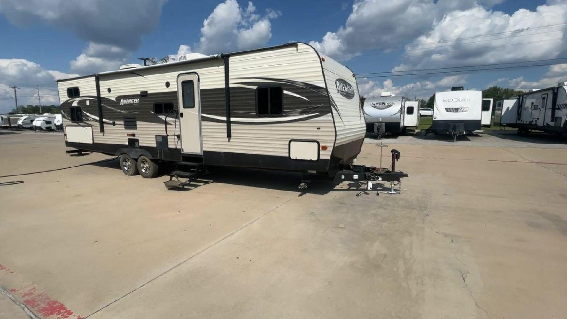 2017 TAN FOREST RIVER AVENGER 31DBS (5ZT2AVWB1HB) , Length: 35.75 ft | Dry Weight: 7,189 lbs. | Gross Weight: 9,589 lbs. | Slides: 1 transmission, located at 4319 N Main St, Cleburne, TX, 76033, (817) 678-5133, 32.385960, -97.391212 - This is the 2017 Forest River Avenger 31DBS. It's your ticket to fun and excitement on the open road with your family. The length of this travel trailer is 35.75 feet and its dry weight is 7,189 lbs. When you walk inside, you'll find a plan that was made for comfort and ease. The bathroom in the bac - Photo#3