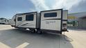 2017 TAN FOREST RIVER FREEDOM EXPRESS 320B (5ZT2FEXB6HA) , Length: 36.92 ft. | Dry Weight: 7,734 lbs. | Gross Weight: 10,700 lbs. | Slides: 3 transmission, located at 4319 N Main St, Cleburne, TX, 76033, (817) 678-5133, 32.385960, -97.391212 - With the 2017 Forest River Freedom Express 320BHDS travel trailer, you can go on amazing experiences. This finely constructed RV is the best option for individuals who want the freedom to experience the great outdoors since it provides the optimal balance of comfort, convenience, and family-friendly - Photo#1