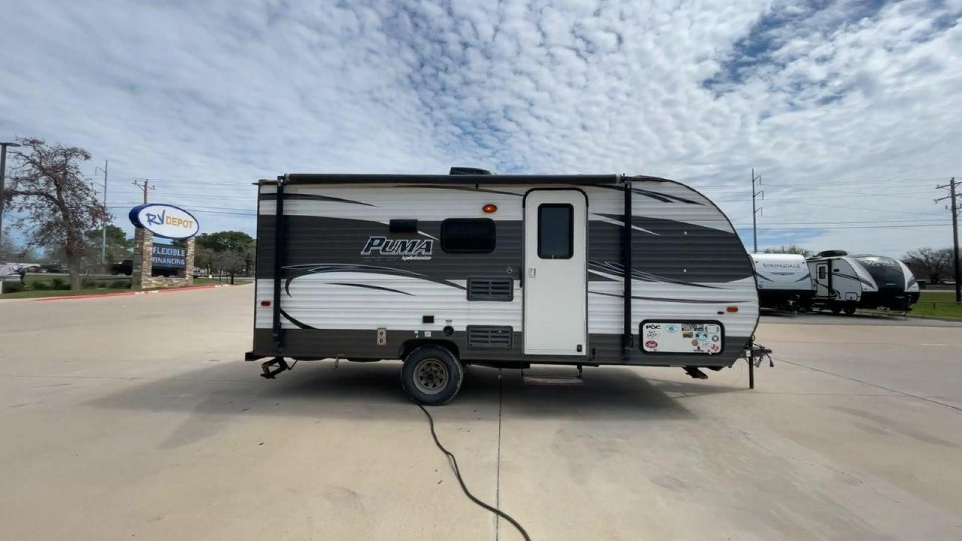 2017 FOREST RIVER PUMA 17QBC (4X4TPU716HP) , Length: 22 ft. | Dry Weight: 3,462 lbs. | Gross Weight: 4,803 lbs. | Slides: 0 transmission, located at 4319 N Main St, Cleburne, TX, 76033, (817) 678-5133, 32.385960, -97.391212 - Lovely and lightweight -- these qualities best describe the 2017 Forest River Puma 17QBC. It measures exactly 22 ft. in length and has a dry weight of 3,462 lbs. It also has a GVWR of 4,803 lbs. and a hitch weight of 403 lbs. This modest yet well-equipped ultra lite travel trailer makes an excellent - Photo#2