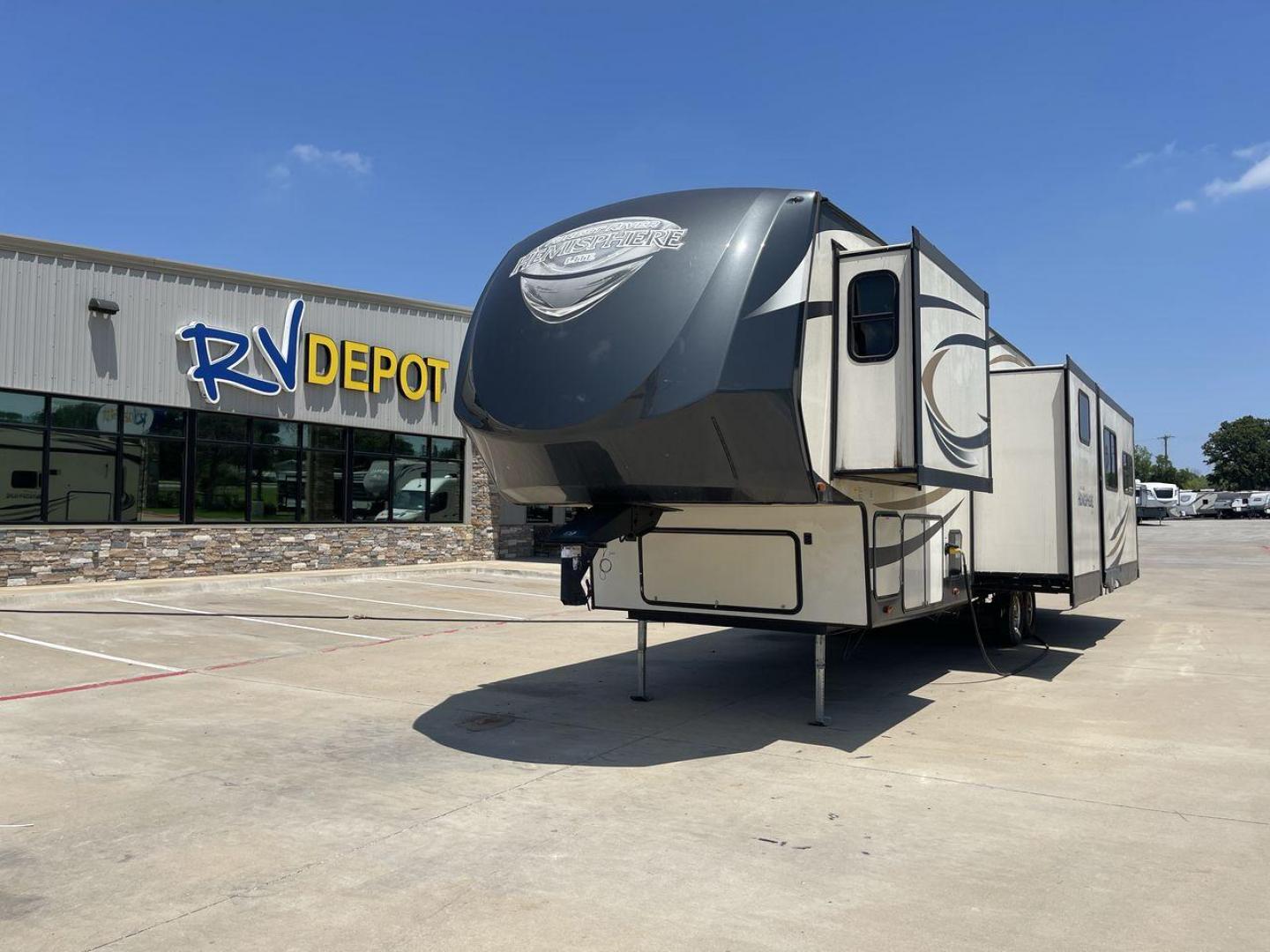 2017 TAN FOREST RIVER SALEM HEMISPHERE (4X4FSBN23HV) , Length: 42 ft.| Dry Weight: 10,924 lbs.| Slides: 4 transmission, located at 4319 N Main St, Cleburne, TX, 76033, (817) 678-5133, 32.385960, -97.391212 - This is a 2017 Salem Hemisphere 368RLBHK fifth wheel. It has dimensions of 42 ft in length, 8 ft in width, and a 13.17 ft height. It has a dry weight of 10,924 lbs and a payload capacity of 3,156 lbs with a hitch weight of 2,080 lbs. This comes with four power-retractable slideouts and one 19 ft pow - Photo#0