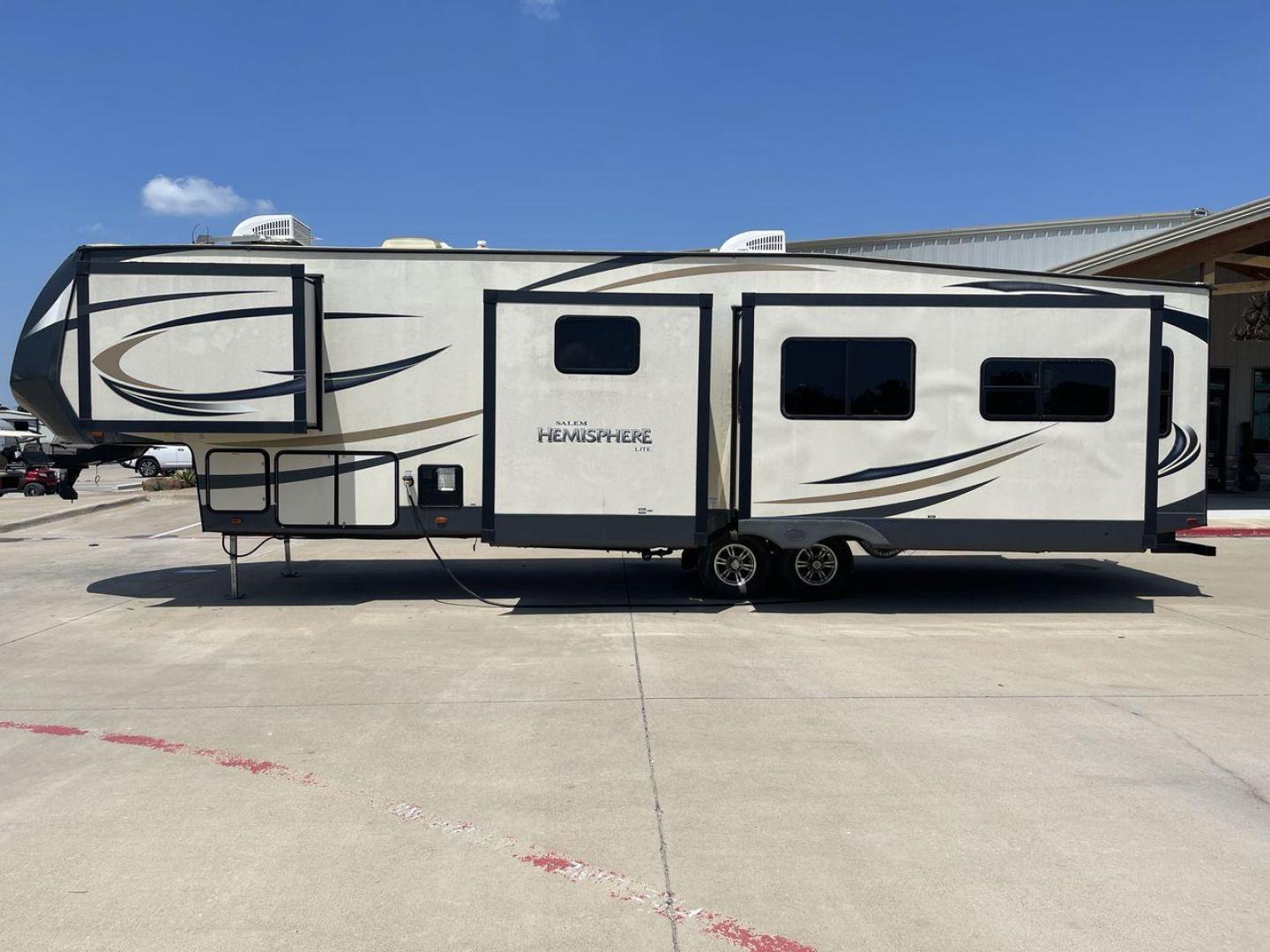 2017 TAN FOREST RIVER SALEM HEMISPHERE (4X4FSBN23HV) , Length: 42 ft.| Dry Weight: 10,924 lbs.| Slides: 4 transmission, located at 4319 N Main St, Cleburne, TX, 76033, (817) 678-5133, 32.385960, -97.391212 - This is a 2017 Salem Hemisphere 368RLBHK fifth wheel. It has dimensions of 42 ft in length, 8 ft in width, and a 13.17 ft height. It has a dry weight of 10,924 lbs and a payload capacity of 3,156 lbs with a hitch weight of 2,080 lbs. This comes with four power-retractable slideouts and one 19 ft pow - Photo#23