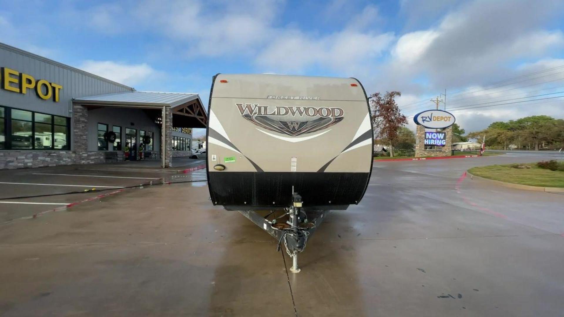 2017 TAN FOREST RIVER WILDWOOD 28CKDS (4X4TWDD28HA) , Length: 34.5 | Dry Weight: 7,822 lbs. | Slides: 2 transmission, located at 4319 N Main St, Cleburne, TX, 76033, (817) 678-5133, 32.385960, -97.391212 - Photo#4