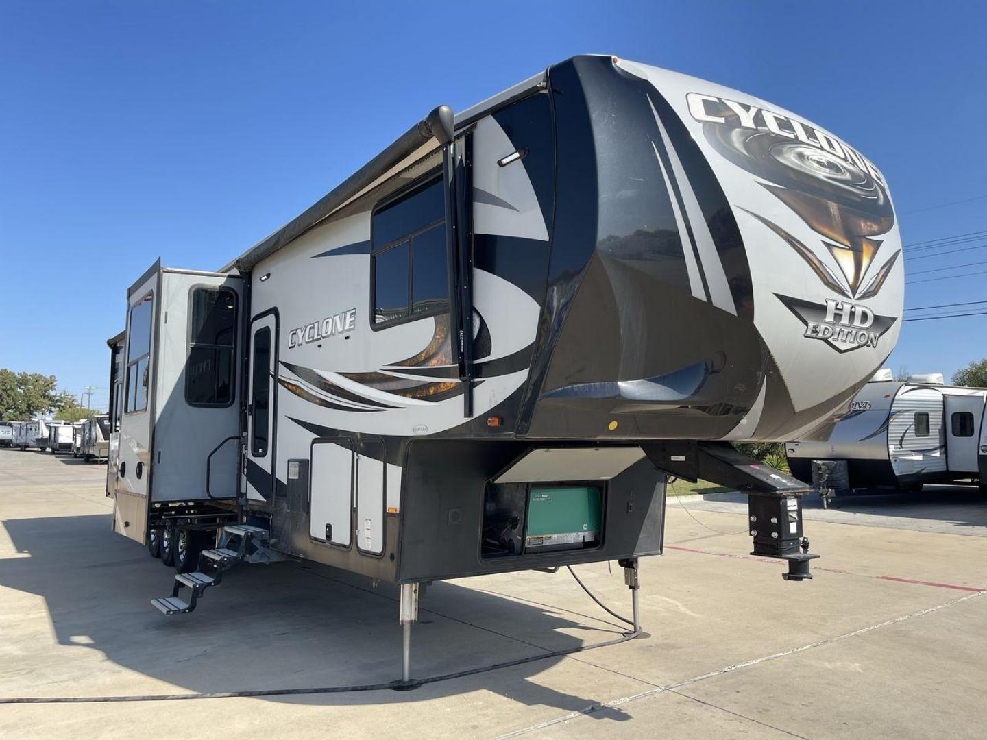 2017 HEARTLAND CYCLONE 4005 (5SFCG4434HE) , Length: 44.1 ft. | Dry Weight: 16,290 lbs.| Gross Weight: 20,000 lbs. | Slides: 3 transmission, located at 4319 N Main St, Cleburne, TX, 76033, (817) 678-5133, 32.385960, -97.391212 - The 2017 Heartland Cyclone 4005 is a luxury fifth-wheel toy hauler that combines comfort and functionality for adventurers who want the flexibility to bring toys along for the ride. Known for its spacious garage, upscale living area, and ample sleeping options, this model is ideal for thrill-seekers - Photo#23