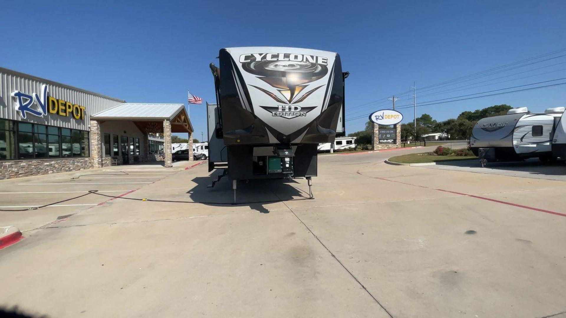 2017 HEARTLAND CYCLONE 4005 (5SFCG4434HE) , Length: 44.1 ft. | Dry Weight: 16,290 lbs.| Gross Weight: 20,000 lbs. | Slides: 3 transmission, located at 4319 N Main St, Cleburne, TX, 76033, (817) 678-5133, 32.385960, -97.391212 - The 2017 Heartland Cyclone 4005 is a luxury fifth-wheel toy hauler that combines comfort and functionality for adventurers who want the flexibility to bring toys along for the ride. Known for its spacious garage, upscale living area, and ample sleeping options, this model is ideal for thrill-seekers - Photo#4