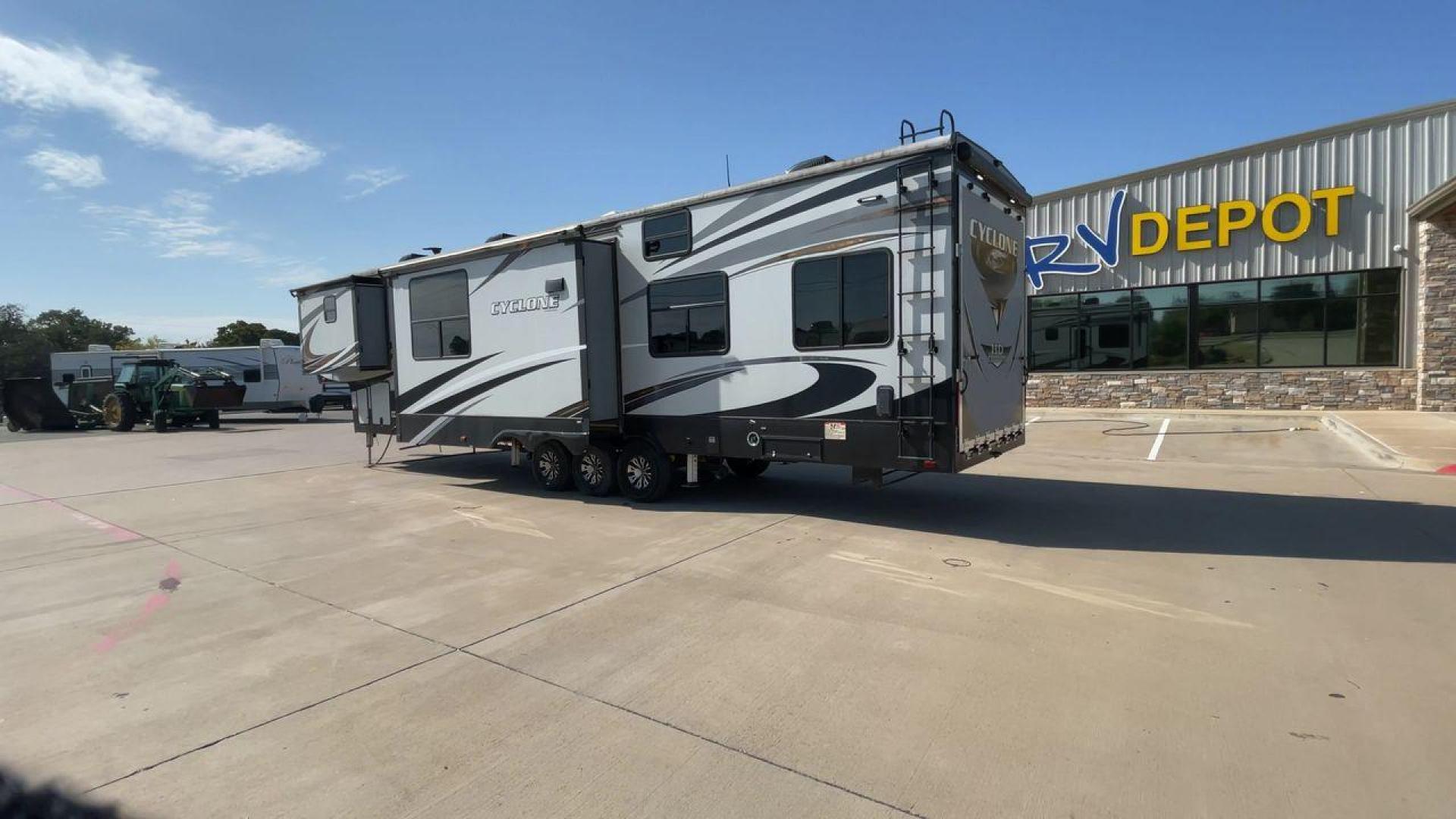 2017 HEARTLAND CYCLONE 4005 (5SFCG4434HE) , Length: 44.1 ft. | Dry Weight: 16,290 lbs.| Gross Weight: 20,000 lbs. | Slides: 3 transmission, located at 4319 N Main St, Cleburne, TX, 76033, (817) 678-5133, 32.385960, -97.391212 - The 2017 Heartland Cyclone 4005 is a luxury fifth-wheel toy hauler that combines comfort and functionality for adventurers who want the flexibility to bring toys along for the ride. Known for its spacious garage, upscale living area, and ample sleeping options, this model is ideal for thrill-seekers - Photo#7