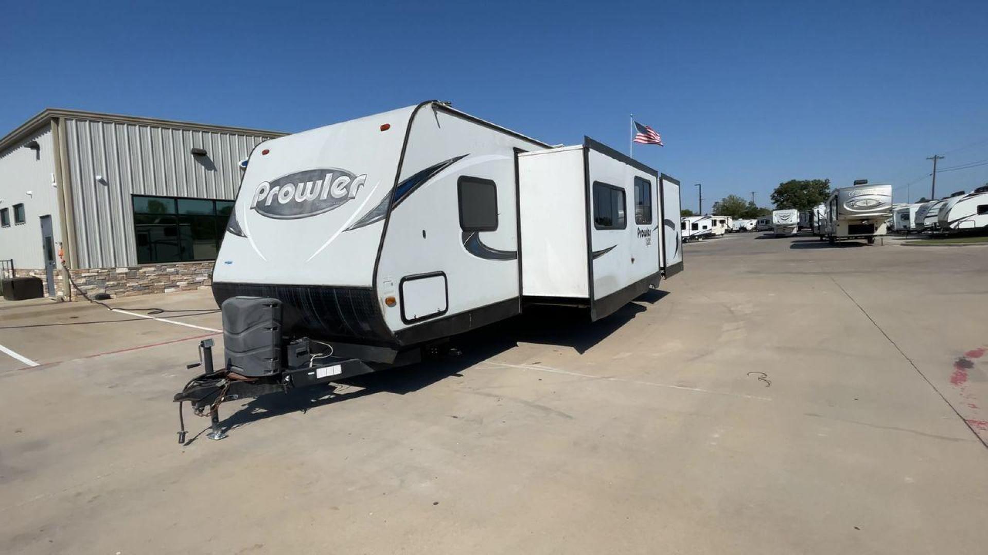 2017 HEARTLAND PROWLER 32LX (5SFPB3622JE) , Length: 36.4 ft. | Dry Weight: 7,880 lbs | Gross Weight: 9,000 lbs | Slides: 2 transmission, located at 4319 N Main St, Cleburne, TX, 76033, (817) 678-5133, 32.385960, -97.391212 - The 2017 Heartland Prowler 32LX travel trailer has dimensions of 36.4 ft in length, 8 ft width, 11.2 ft height, and 6.8 ft interior height. It has a base weight of 7,880 lbs with a 9,000 lbs GVWR and a carrying capacity of 1,120 lbs. This unit highlights an outdoor kitchen, a rear bunkhouse, a p - Photo#5