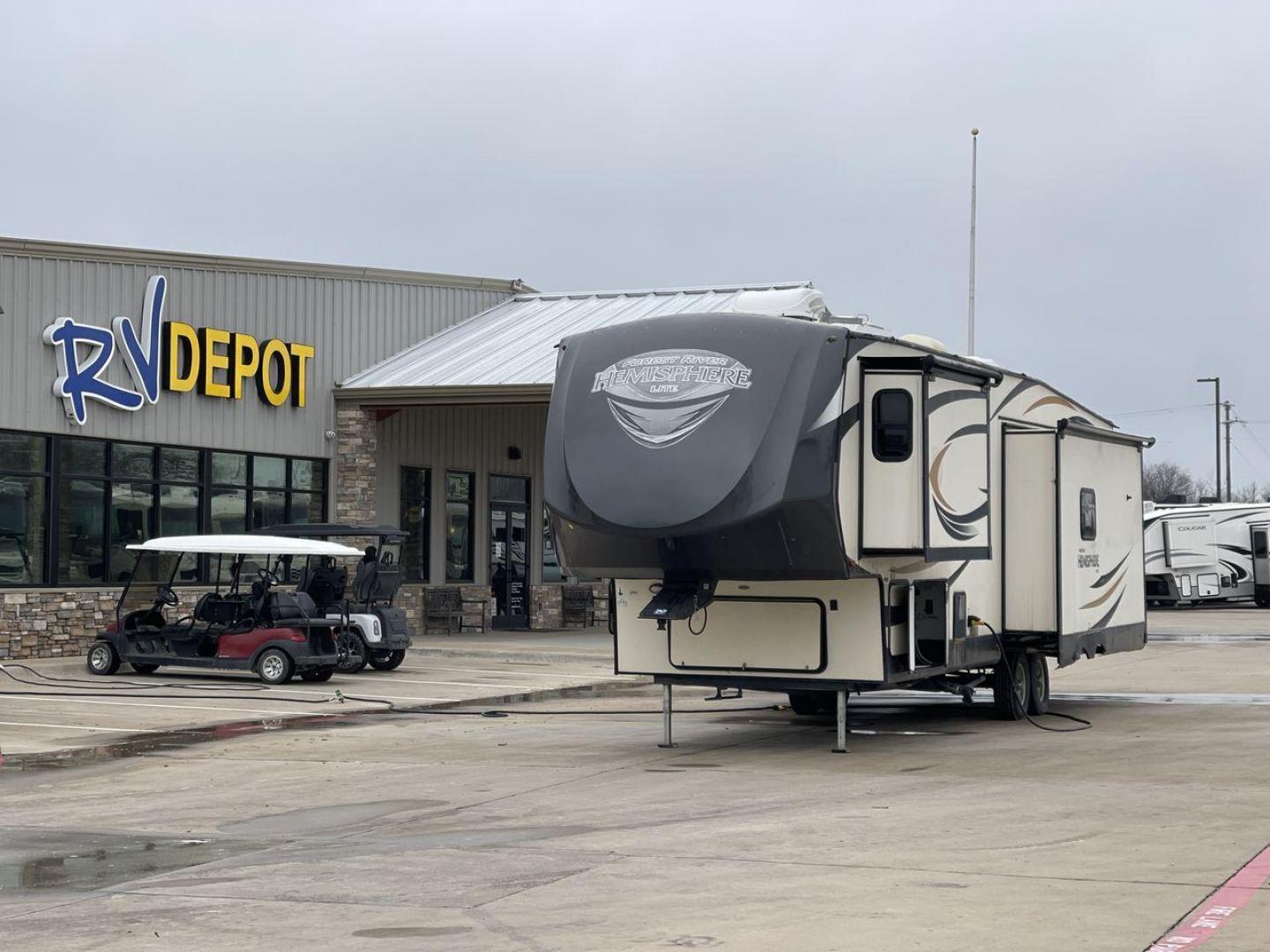 2017 TAN HEMISPHERE 337BAR (4X4FSBK25HV) , Length: 39.58 ft. | Dry Weight: 10,069 lbs. | Slides: 3 transmission, located at 4319 N Main St, Cleburne, TX, 76033, (817) 678-5133, 32.385960, -97.391212 - This 2017 Forest River Salem Hemisphere Lite 337BAR fifth wheel measures 39.58 feet. It is a dual axle, aluminum wheel setup with electric drum brakes. Its dry weight is 10,069 lbs, its payload capacity is 2,321 lbs, and its hitch weight is 1,990 lbs. The fiberglass exterior is painted white with bl - Photo#0