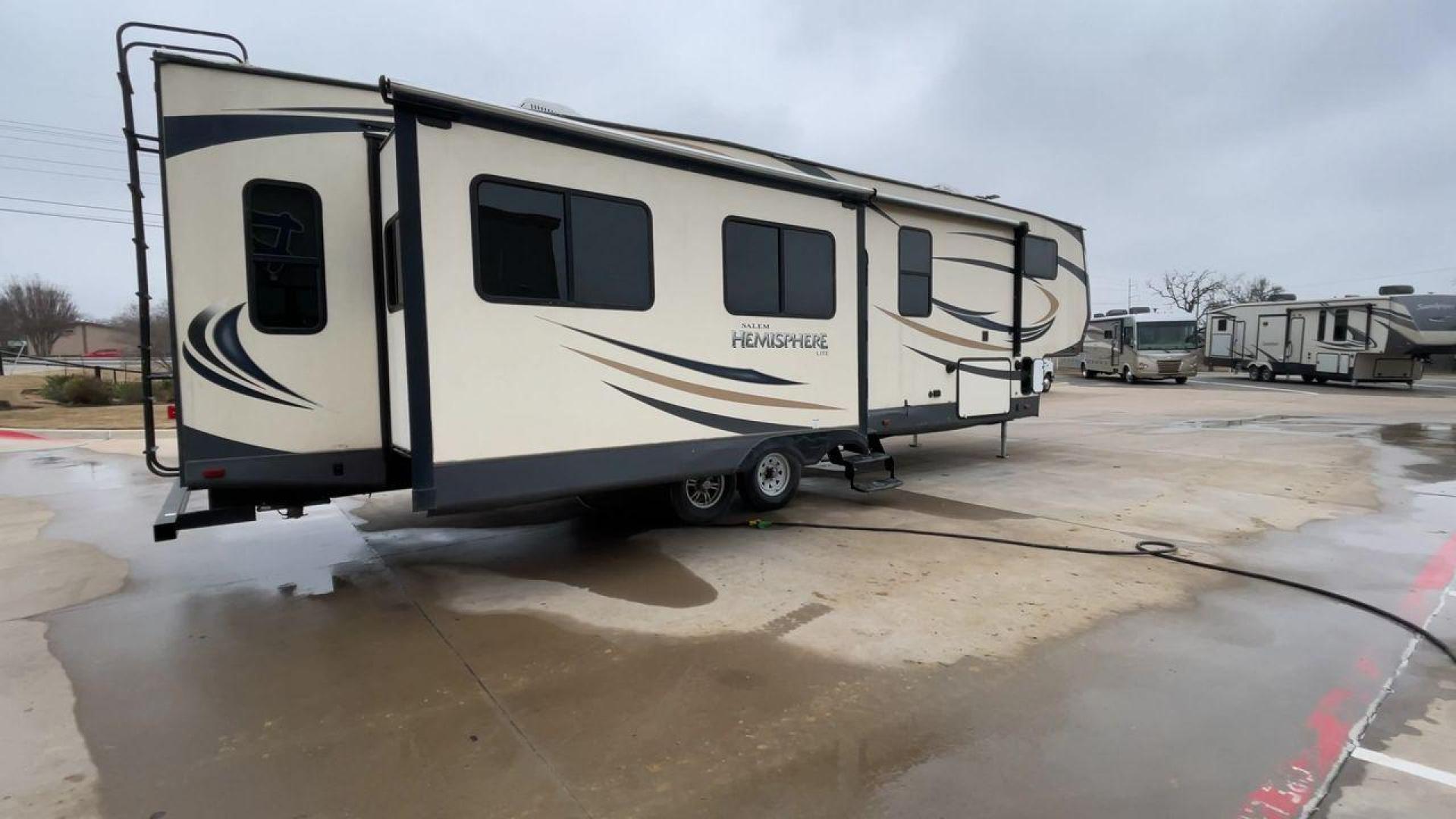 2017 TAN HEMISPHERE 337BAR (4X4FSBK25HV) , Length: 39.58 ft. | Dry Weight: 10,069 lbs. | Slides: 3 transmission, located at 4319 N Main St, Cleburne, TX, 76033, (817) 678-5133, 32.385960, -97.391212 - This 2017 Forest River Salem Hemisphere Lite 337BAR fifth wheel measures 39.58 feet. It is a dual axle, aluminum wheel setup with electric drum brakes. Its dry weight is 10,069 lbs, its payload capacity is 2,321 lbs, and its hitch weight is 1,990 lbs. The fiberglass exterior is painted white with bl - Photo#1