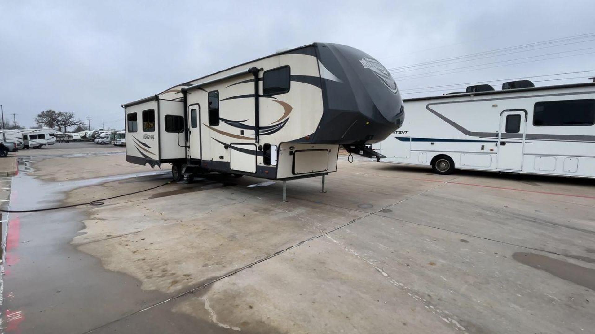 2017 TAN HEMISPHERE 337BAR (4X4FSBK25HV) , Length: 39.58 ft. | Dry Weight: 10,069 lbs. | Slides: 3 transmission, located at 4319 N Main St, Cleburne, TX, 76033, (817) 678-5133, 32.385960, -97.391212 - This 2017 Forest River Salem Hemisphere Lite 337BAR fifth wheel measures 39.58 feet. It is a dual axle, aluminum wheel setup with electric drum brakes. Its dry weight is 10,069 lbs, its payload capacity is 2,321 lbs, and its hitch weight is 1,990 lbs. The fiberglass exterior is painted white with bl - Photo#3