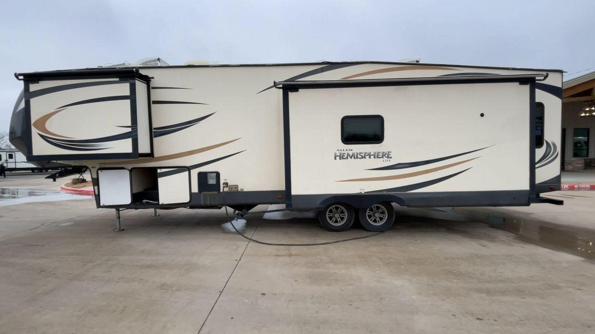 2017 TAN HEMISPHERE 337BAR (4X4FSBK25HV) , Length: 39.58 ft. | Dry Weight: 10,069 lbs. | Slides: 3 transmission, located at 4319 N Main St, Cleburne, TX, 76033, (817) 678-5133, 32.385960, -97.391212 - This 2017 Forest River Salem Hemisphere Lite 337BAR fifth wheel measures 39.58 feet. It is a dual axle, aluminum wheel setup with electric drum brakes. Its dry weight is 10,069 lbs, its payload capacity is 2,321 lbs, and its hitch weight is 1,990 lbs. The fiberglass exterior is painted white with bl - Photo#6