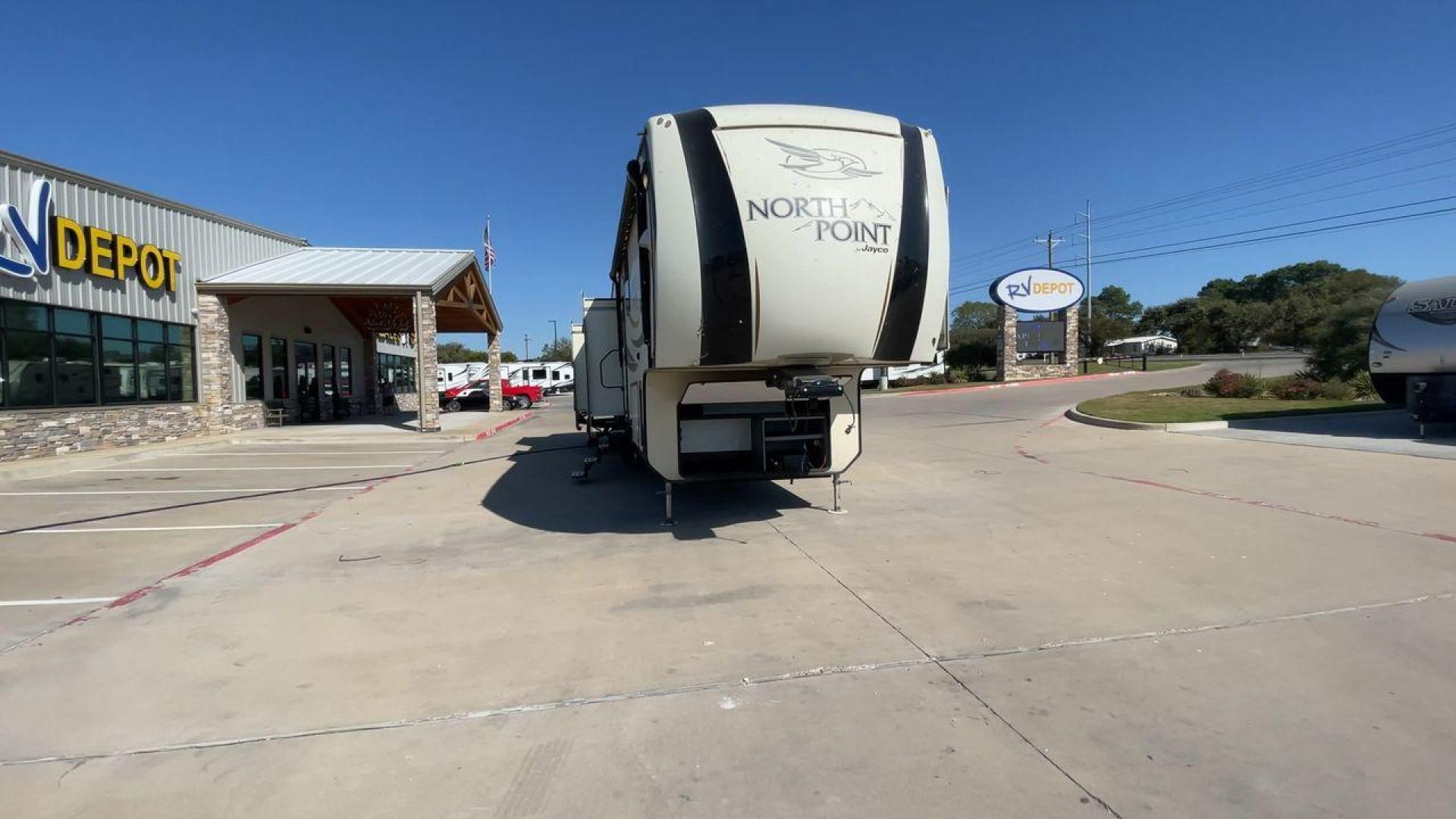 2017 TAN JAYCO NORTH POINT 375BHFS (1UJCJ0BV2H1) , Length: 43.25 ft.| Dry Weight: 13,740 lbs. | Gross Weight: 16,500 lbs. | Slides: 5 transmission, located at 4319 N Main St, Cleburne, TX, 76033, (817) 678-5133, 32.385960, -97.391212 - Five slides, one-and-a-half baths, a bunkhouse, and an outdoor kitchen are just some of the highlights of this North Point fifth wheel model 375BHFS by Jayco. This fifth wheel measures 43.25 ft in length, 8 ft in width, 13.33 ft in height, and 6.83 ft in interior height. It has a dry weight of 1 - Photo#4