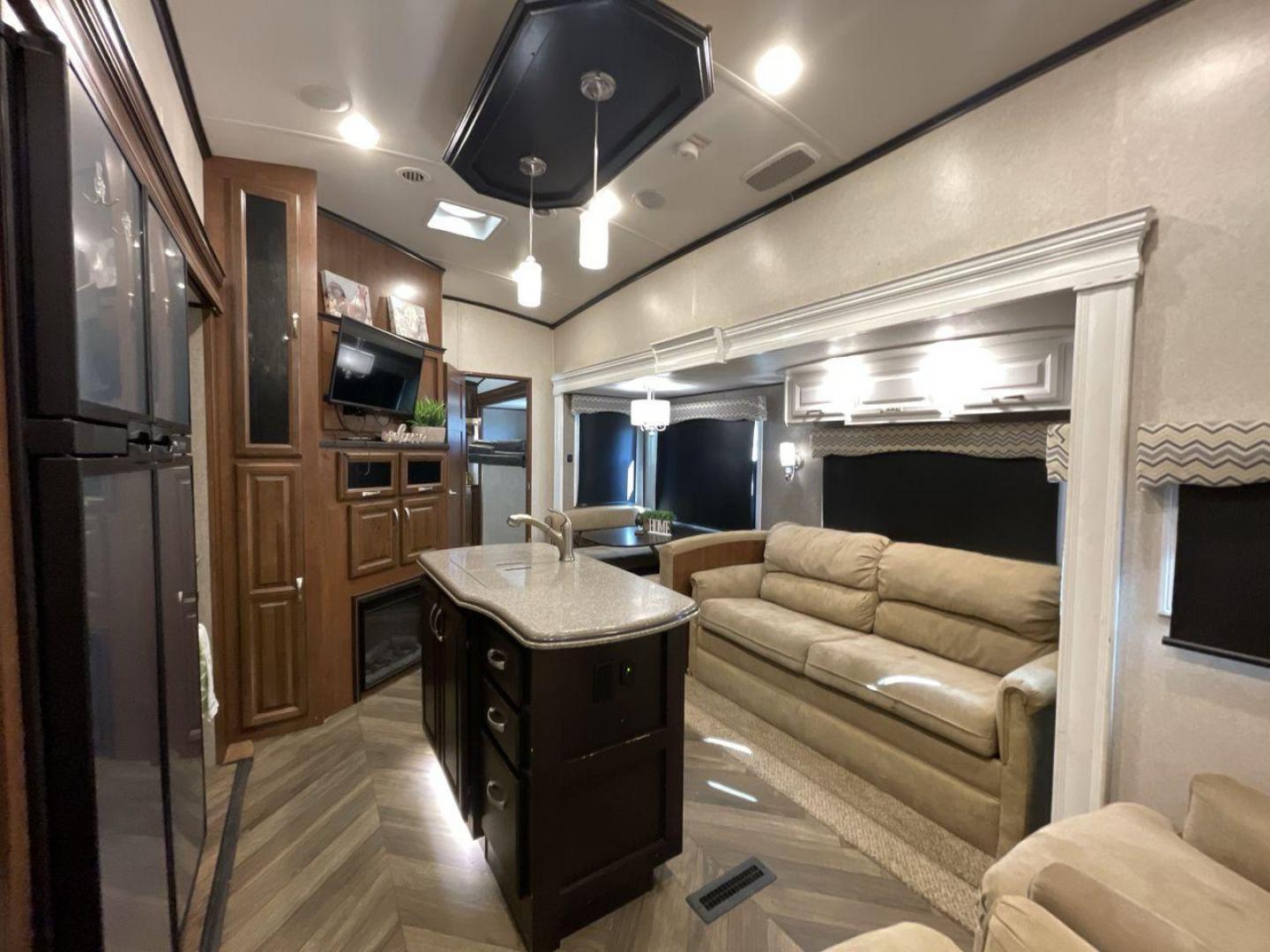 2017 TAN JAYCO NORTH POINT 375BHFS (1UJCJ0BV2H1) , Length: 43.25 ft.| Dry Weight: 13,740 lbs. | Gross Weight: 16,500 lbs. | Slides: 5 transmission, located at 4319 N Main St, Cleburne, TX, 76033, (817) 678-5133, 32.385960, -97.391212 - Five slides, one-and-a-half baths, a bunkhouse, and an outdoor kitchen are just some of the highlights of this North Point fifth wheel model 375BHFS by Jayco. This fifth wheel measures 43.25 ft in length, 8 ft in width, 13.33 ft in height, and 6.83 ft in interior height. It has a dry weight of 1 - Photo#11