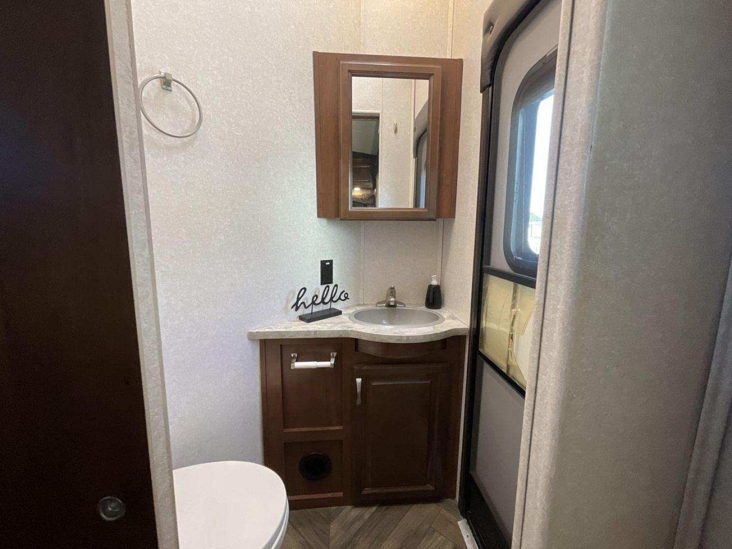 2017 TAN JAYCO NORTH POINT 375BHFS (1UJCJ0BV2H1) , Length: 43.25 ft.| Dry Weight: 13,740 lbs. | Gross Weight: 16,500 lbs. | Slides: 5 transmission, located at 4319 N Main St, Cleburne, TX, 76033, (817) 678-5133, 32.385960, -97.391212 - Five slides, one-and-a-half baths, a bunkhouse, and an outdoor kitchen are just some of the highlights of this North Point fifth wheel model 375BHFS by Jayco. This fifth wheel measures 43.25 ft in length, 8 ft in width, 13.33 ft in height, and 6.83 ft in interior height. It has a dry weight of 1 - Photo#26