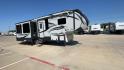 2017 GRAY KEYSTONE AVALANCHE 300RE (4YDF30028HE) , Length: 34.5 ft. | Dry Weight: 11,489 lbs. | Gross Weight: 15,000 lbs. | Slides: 3 transmission, located at 4319 N Main St, Cleburne, TX, 76033, (817) 678-5133, 32.385960, -97.391212 - The 2017 Keystone Avalanche 300RE is a dual-axle aluminum wheel setup measuring 34.5 ft. in length. It has a dry weight of 11,489 lbs. and a GVWR of 15,000 lbs. Its exterior is a base color of silver with black, gray, and white graphics. It is made of aluminum and fiberglass. With 3 slides, it is ro - Photo#3