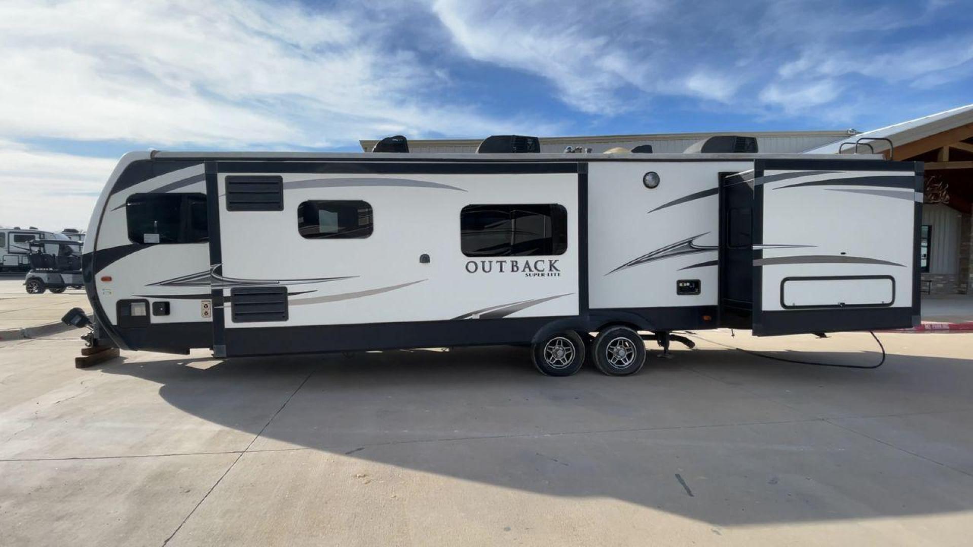 2017 KEYSTONE OUTBACK 332FK (4YDT33229HB) , Length: 37.83 ft. | Dry Weight: 8,475 lbs. | Gross Weight: 10,500 lbs. | Slides: 3 transmission, located at 4319 N Main St, Cleburne, TX, 76033, (817) 678-5133, 32.385960, -97.391212 - Photo#6