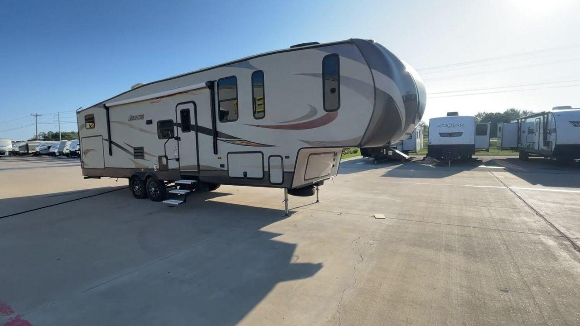 2017 BROWN KEYSTONE SPRINTER 324FWBHS (4YDF32424H1) , Length: 38.83 ft. | Dry Weight: 10,770 lbs. | Gross Weight: 14,000 lbs. | Slides: 3 transmission, located at 4319 N Main St, Cleburne, TX, 76033, (817) 678-5133, 32.385960, -97.391212 - The 2017 Keystone Sprinter 324FWBHS defines premium residential living on the go. It comes equipped with an outside kitchen with a fridge and cooktop as well as a TV cabinet. It has a large power awning with LED lights to light up your campsite. Inside, you will find a spacious living and kitchen ar - Photo#3