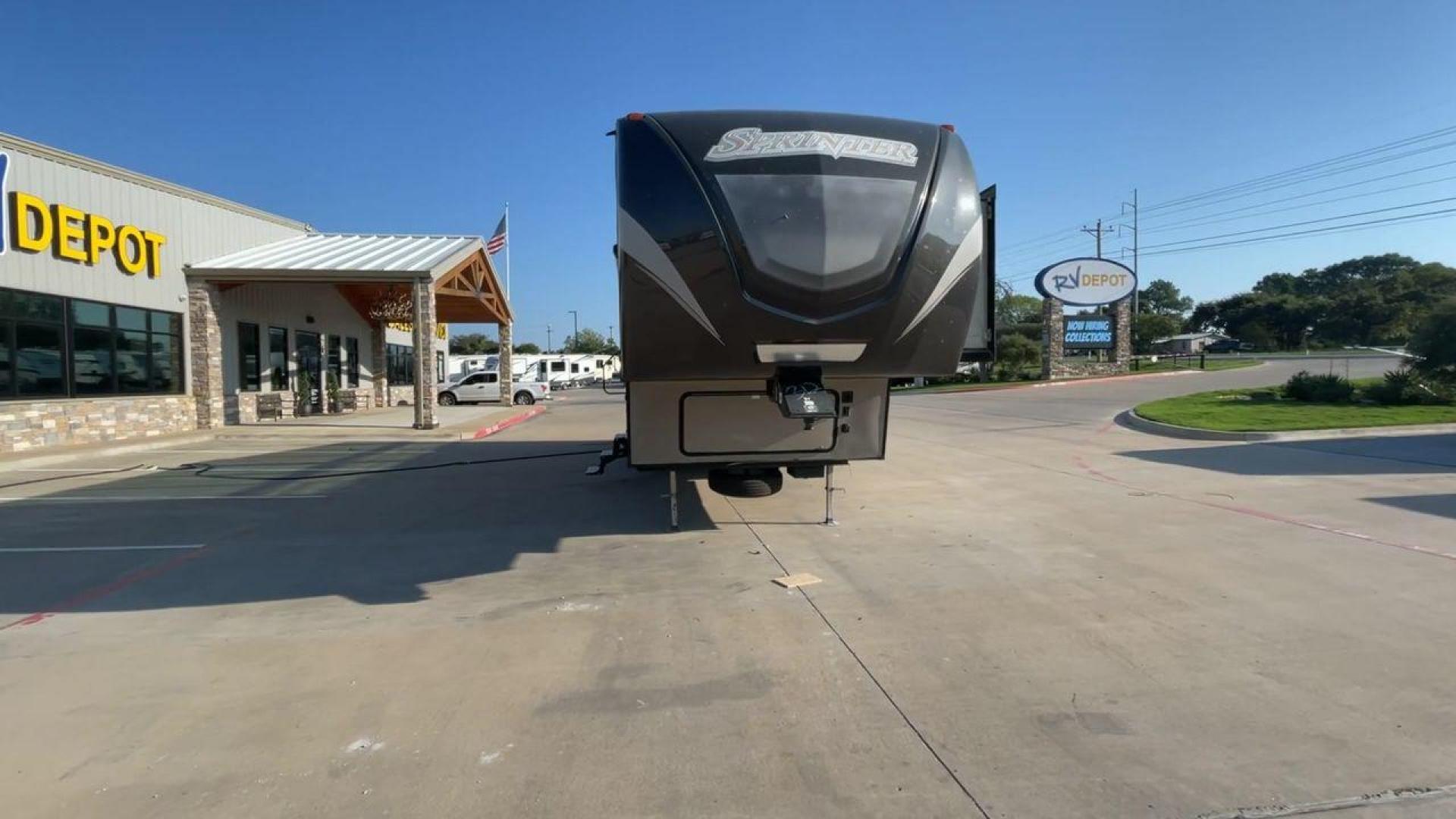 2017 BROWN KEYSTONE SPRINTER 324FWBHS (4YDF32424H1) , Length: 38.83 ft. | Dry Weight: 10,770 lbs. | Gross Weight: 14,000 lbs. | Slides: 3 transmission, located at 4319 N Main St, Cleburne, TX, 76033, (817) 678-5133, 32.385960, -97.391212 - The 2017 Keystone Sprinter 324FWBHS defines premium residential living on the go. It comes equipped with an outside kitchen with a fridge and cooktop as well as a TV cabinet. It has a large power awning with LED lights to light up your campsite. Inside, you will find a spacious living and kitchen ar - Photo#4