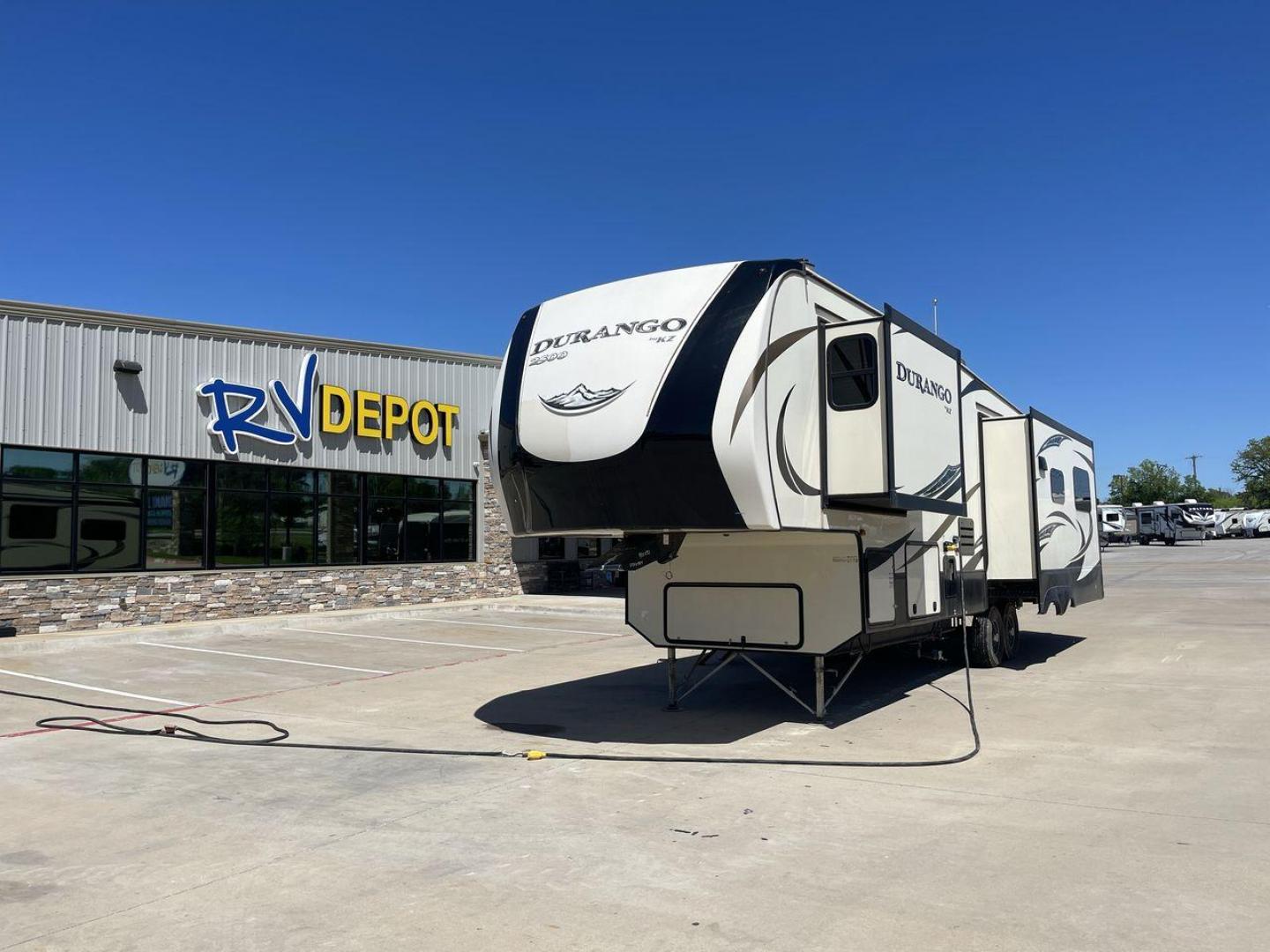 2017 TAN KZ DURANGO 336RET (4EZFD3324H6) , Length: 35.33 ft. | Dry Weight: 10,070 lbs. | Gross Weight: 12,500 lbs. | Slides: 3 transmission, located at 4319 N Main St, Cleburne, TX, 76033, (817) 678-5133, 32.385960, -97.391212 - The 2017 K-Z Durango 336RET is a fantastic residential fifth wheel with numerous luxurious features you will enjoy in an RV! This Durango measures 35.33 ft. in length and 12.83 ft. in height. It has a dry weight of 10,070 lbs. and a GVWR of 12,500 lbs. You will be able to pull this fifth wheel with - Photo#0