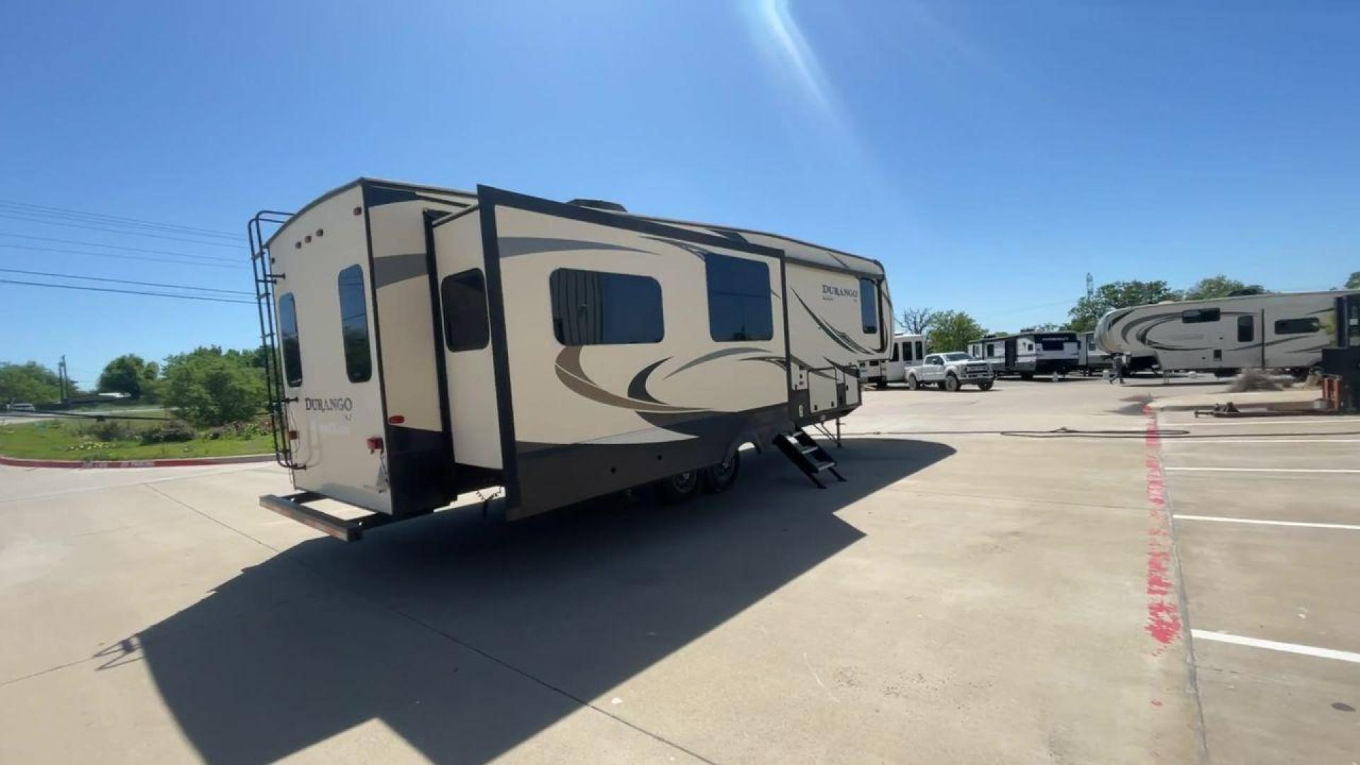 2017 TAN KZ DURANGO 336RET (4EZFD3324H6) , Length: 35.33 ft. | Dry Weight: 10,070 lbs. | Gross Weight: 12,500 lbs. | Slides: 3 transmission, located at 4319 N Main St, Cleburne, TX, 76033, (817) 678-5133, 32.385960, -97.391212 - The 2017 K-Z Durango 336RET is a fantastic residential fifth wheel with numerous luxurious features you will enjoy in an RV! This Durango measures 35.33 ft. in length and 12.83 ft. in height. It has a dry weight of 10,070 lbs. and a GVWR of 12,500 lbs. You will be able to pull this fifth wheel with - Photo#1