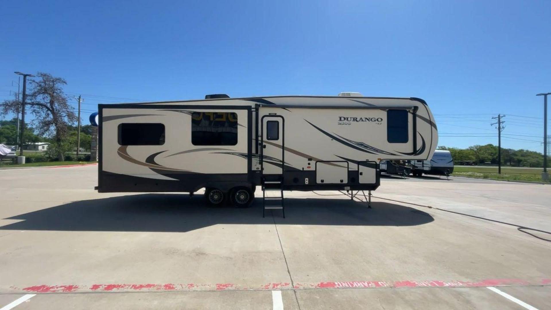 2017 TAN KZ DURANGO 336RET (4EZFD3324H6) , Length: 35.33 ft. | Dry Weight: 10,070 lbs. | Gross Weight: 12,500 lbs. | Slides: 3 transmission, located at 4319 N Main St, Cleburne, TX, 76033, (817) 678-5133, 32.385960, -97.391212 - The 2017 K-Z Durango 336RET is a fantastic residential fifth wheel with numerous luxurious features you will enjoy in an RV! This Durango measures 35.33 ft. in length and 12.83 ft. in height. It has a dry weight of 10,070 lbs. and a GVWR of 12,500 lbs. You will be able to pull this fifth wheel with - Photo#2