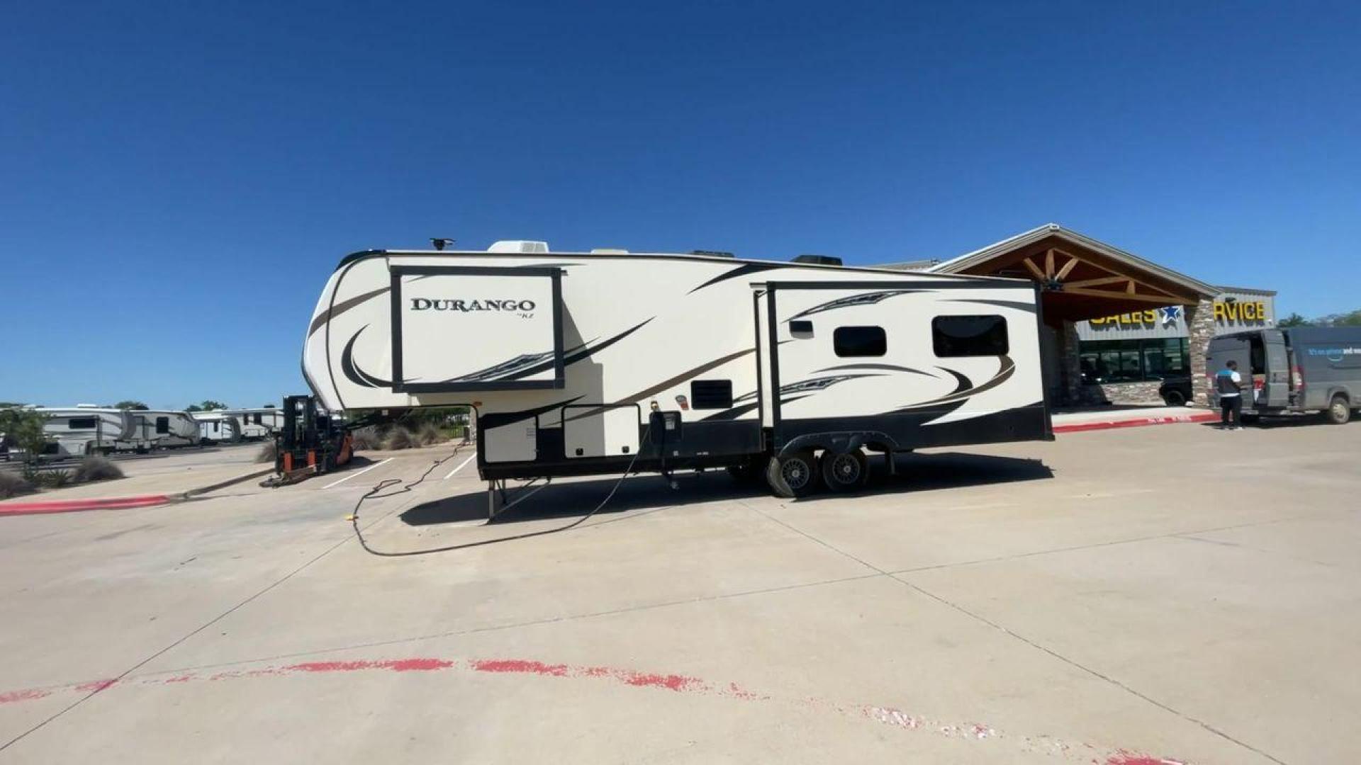 2017 TAN KZ DURANGO 336RET (4EZFD3324H6) , Length: 35.33 ft. | Dry Weight: 10,070 lbs. | Gross Weight: 12,500 lbs. | Slides: 3 transmission, located at 4319 N Main St, Cleburne, TX, 76033, (817) 678-5133, 32.385960, -97.391212 - The 2017 K-Z Durango 336RET is a fantastic residential fifth wheel with numerous luxurious features you will enjoy in an RV! This Durango measures 35.33 ft. in length and 12.83 ft. in height. It has a dry weight of 10,070 lbs. and a GVWR of 12,500 lbs. You will be able to pull this fifth wheel with - Photo#6