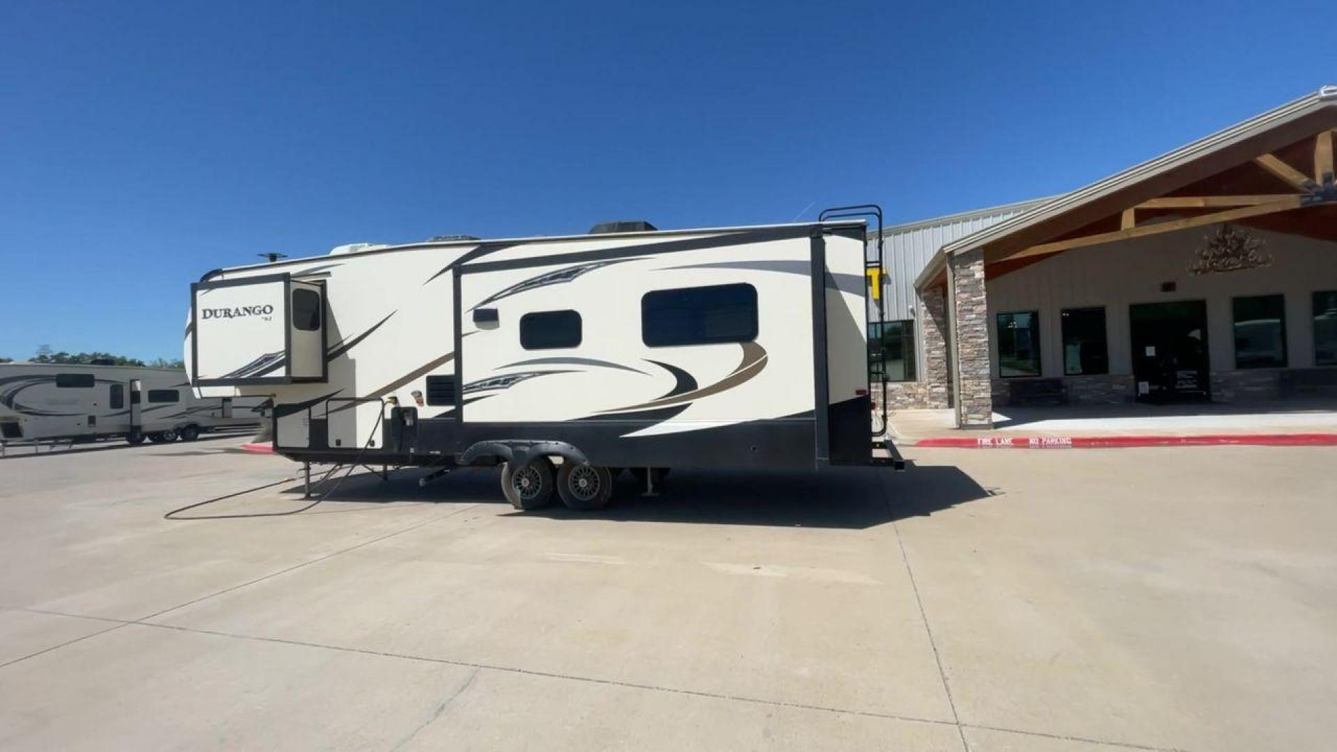 2017 TAN KZ DURANGO 336RET (4EZFD3324H6) , Length: 35.33 ft. | Dry Weight: 10,070 lbs. | Gross Weight: 12,500 lbs. | Slides: 3 transmission, located at 4319 N Main St, Cleburne, TX, 76033, (817) 678-5133, 32.385960, -97.391212 - The 2017 K-Z Durango 336RET is a fantastic residential fifth wheel with numerous luxurious features you will enjoy in an RV! This Durango measures 35.33 ft. in length and 12.83 ft. in height. It has a dry weight of 10,070 lbs. and a GVWR of 12,500 lbs. You will be able to pull this fifth wheel with - Photo#7