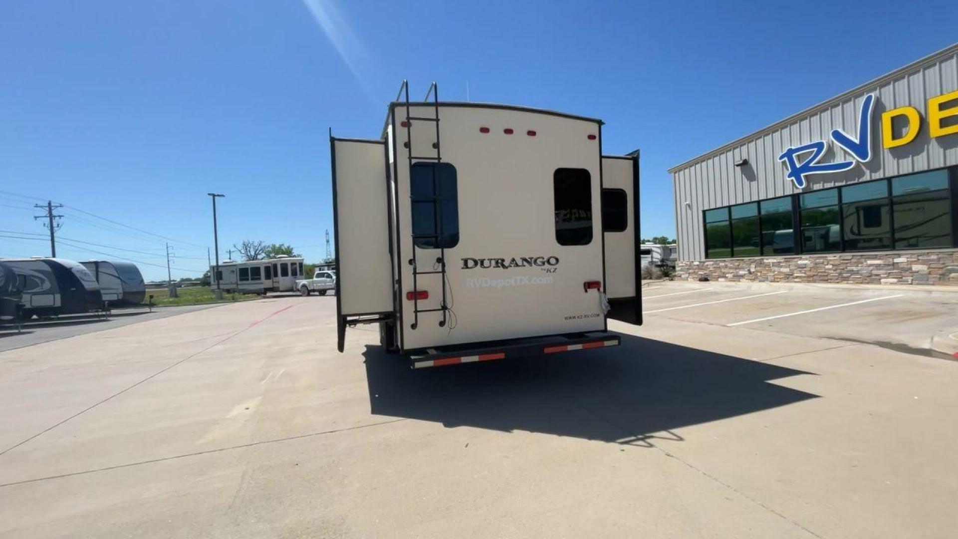 2017 TAN KZ DURANGO 336RET (4EZFD3324H6) , Length: 35.33 ft. | Dry Weight: 10,070 lbs. | Gross Weight: 12,500 lbs. | Slides: 3 transmission, located at 4319 N Main St, Cleburne, TX, 76033, (817) 678-5133, 32.385960, -97.391212 - The 2017 K-Z Durango 336RET is a fantastic residential fifth wheel with numerous luxurious features you will enjoy in an RV! This Durango measures 35.33 ft. in length and 12.83 ft. in height. It has a dry weight of 10,070 lbs. and a GVWR of 12,500 lbs. You will be able to pull this fifth wheel with - Photo#8