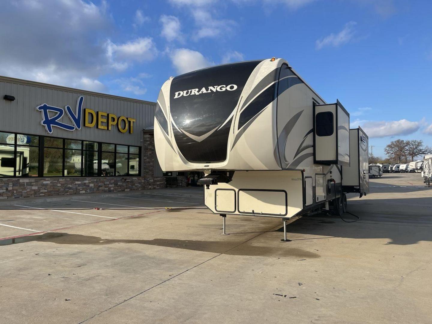 2017 KZ DURANGO GOLD 366FBT (4EZFV3624H6) , located at 4319 N Main St, Cleburne, TX, 76033, (817) 678-5133, 32.385960, -97.391212 - Discover extra features that contribute to making this RV an ideal investment. (1) Stretch out in 11,470 lbs of pure luxury with multiple slide-outs that transform the living area into a haven for families or couples seeking space. (2) It has a walk-in closet and a spa-like bathroom with a showe - Photo#0