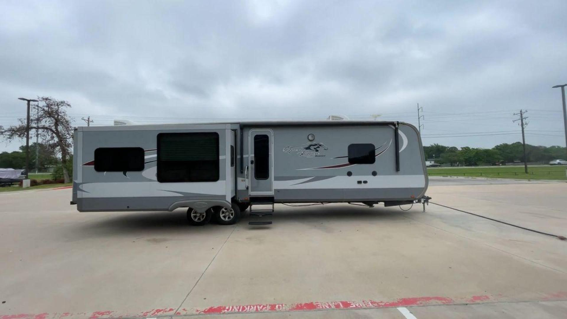 2017 OPEN RANGE ROAMER 323RLS (58TTL3821H5) , Length: 37.7 ft | Dry Weight: 8,815 lbs. | Gross Weight: 11,435 lbs | Slides: 3 transmission, located at 4319 N Main St, Cleburne, TX, 76033, (817) 678-5133, 32.385960, -97.391212 - The 2017 Open Range Roamer 323RLS is a top-of-the-line travel trailer. With a length of 37.7 feet and a dry weight of 8,815 pounds, this spacious model offers plenty of room for relaxation and entertainment. Featuring three slides, the Roamer 323RLS maximizes interior space, creating a welcoming and - Photo#2