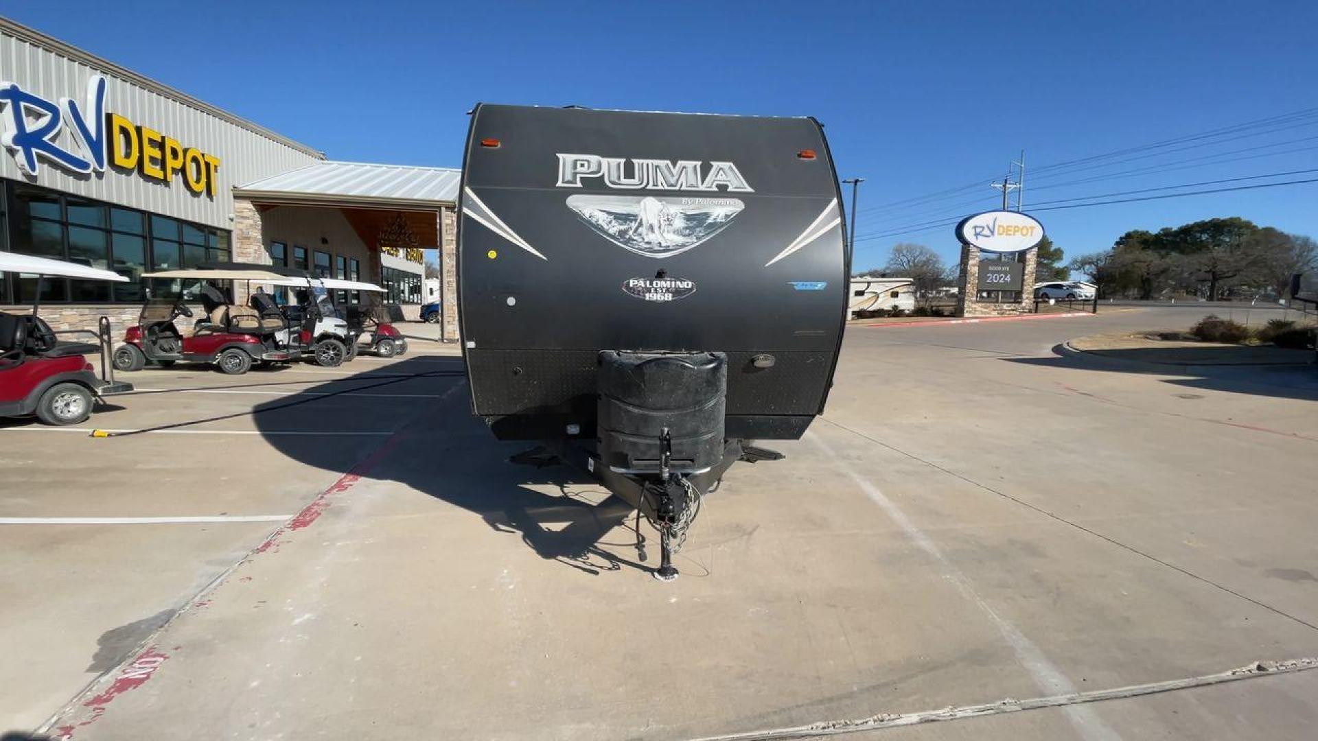 2017 PUMA XLITE28FQDB (4X4TPUD22HP) , Length: 33 ft | Dry Weight: 6,370 lbs | Gross Weight: 8,000 lbs | Slides: 1 transmission, located at 4319 N Main St, Cleburne, TX, 76033, (817) 678-5133, 32.385960, -97.391212 - The 2017 Puma 28FQDB travel trailer is ideal for family excursions. With a length of 33 feet and a dry weight of 6,370 pounds, this RV is both large and lightweight, making it simple to tow and navigate on the road. With an outdoor kitchen and a large 20-foot motorized awning, you can enjoy outdoor - Photo#4