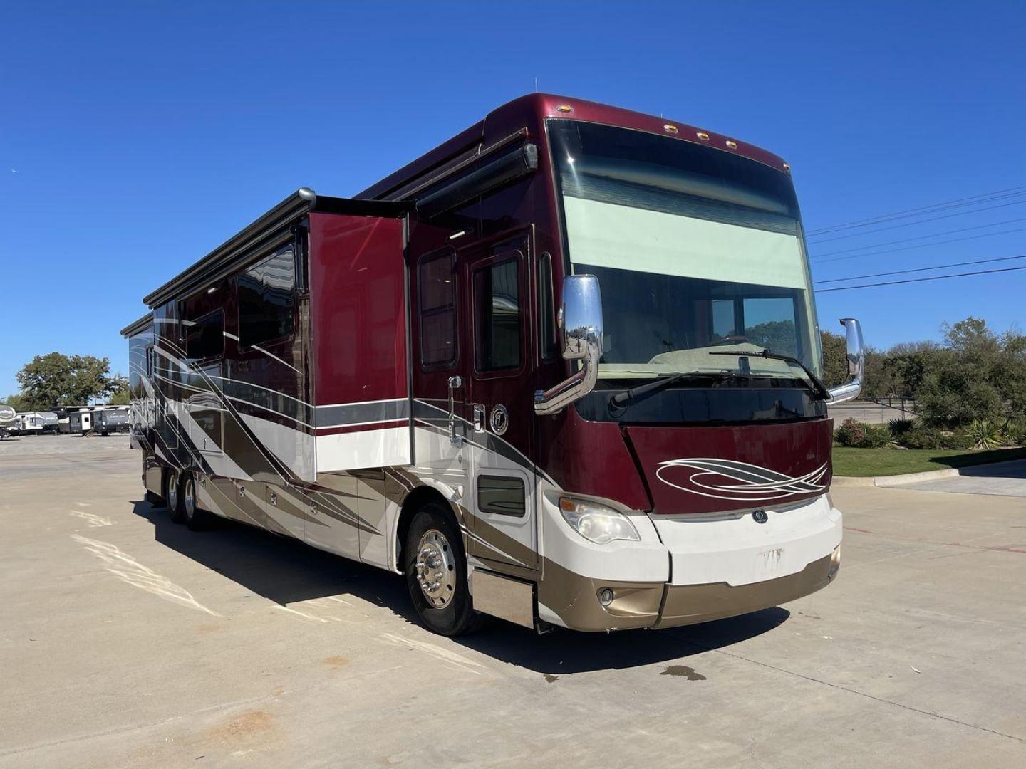 2017 TIFFIN ALLEGRO BUS 45OPP (5VBBAK7A6HA) , Length: 45 ft | Gross Weight: 51,000 lbs | Slides: 4 transmission, located at 4319 N Main St, Cleburne, TX, 76033, (817) 678-5133, 32.385960, -97.391212 - The 2017 TIFFIN ALLEGRO BUS 45OPP features a luxurious exterior with a striking maroon, white, and beige paint scheme. The large, sleek side panels are accentuated by elegant, sweeping graphics, giving it an upscale, eye-catching look. The motorhome is built on a spacious chassis, with a prominent f - Photo#23