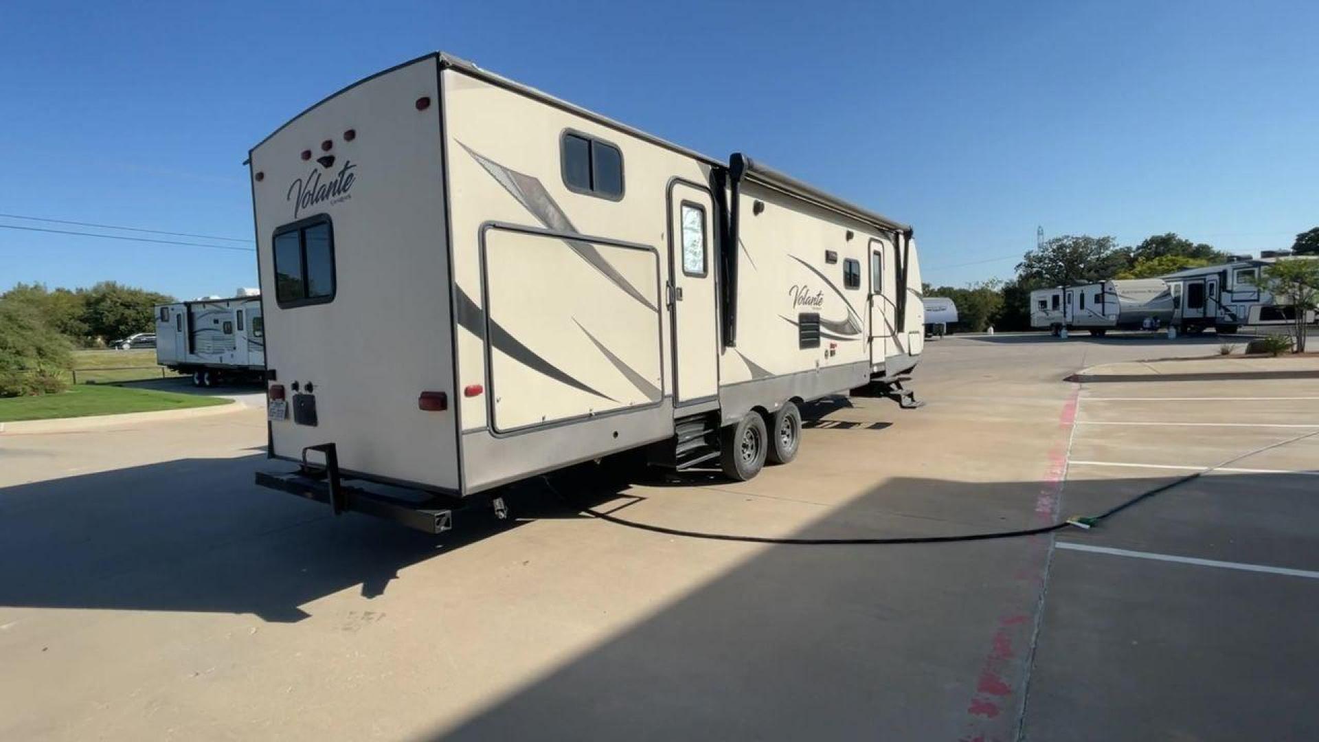 2018 TAN CROSSROADS VOLANTE 32SB (4YDT32S28J6) , Length: 36.5 ft. | Dry Weight: 7,756 lbs. | Gross Weight: 9,750 lbs. | Slides: 2 transmission, located at 4319 N Main St, Cleburne, TX, 76033, (817) 678-5133, 32.385960, -97.391212 - Photo#1