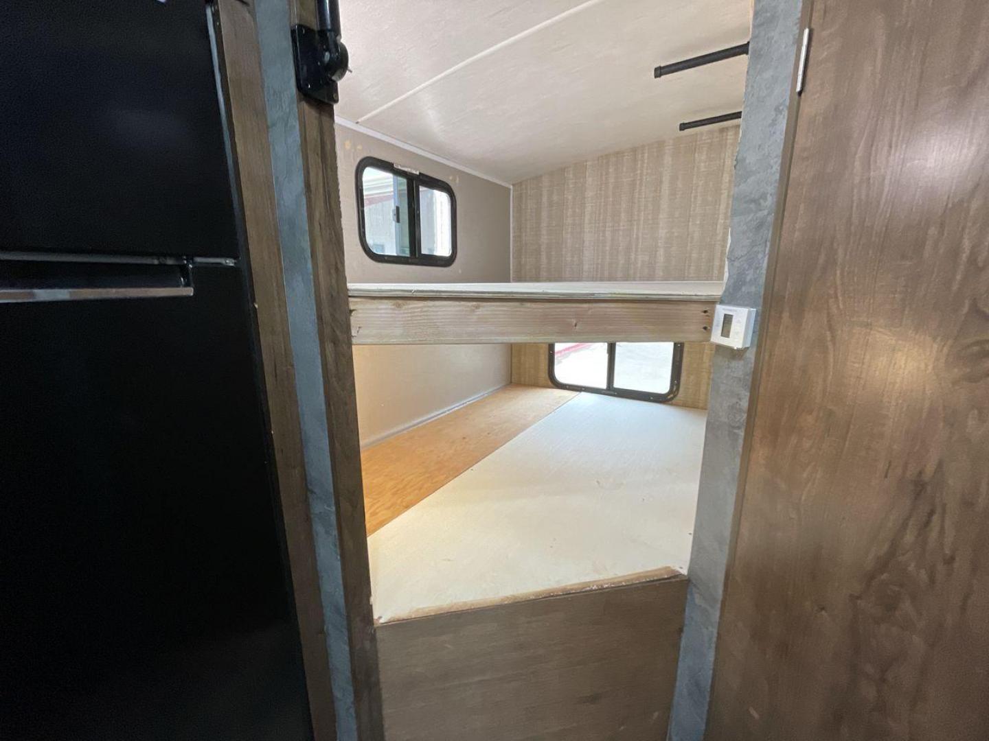 2018 TAN CRUISER RV MPG 2400BH (5RXHB2927J2) , Length: 29.08 ft. | Dry Weight: 5,320 lbs. | Gross Weight: 7,565 lbs. | Slides: 1 transmission, located at 4319 N Main St, Cleburne, TX, 76033, (817) 678-5133, 32.385960, -97.391212 - Camping is more enjoyable when you include a few more of your friends. In this 2018 Cruiser MPG 2400BH travel trailer, you can accommodate a few extra guests thanks to a rear set of double-sized bunk beds. The dimensions of this unit are 29.08 ft in length, 8 ft in width, 11.08 ft in height, and - Photo#19