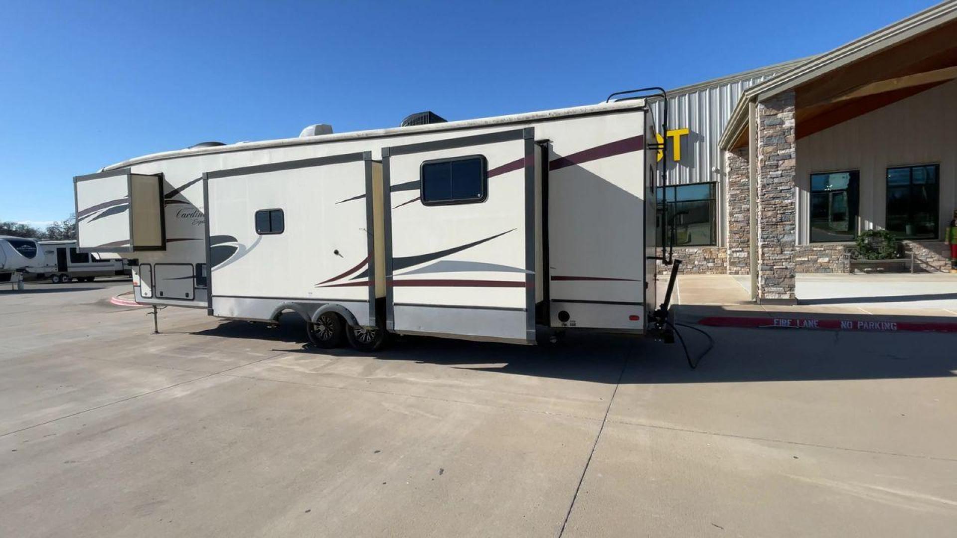 2018 TAN FOREST RIVER CARDINAL EXPLORER 38 (4X4FCAP2XJG) , Length: 42.08 ft. | Dry Weight: 13,289 lbs. | Gross Weight: 16,514 lbs. | Slides: 4 transmission, located at 4319 N Main St, Cleburne, TX, 76033, (817) 678-5133, 32.385960, -97.391212 - Photo#7