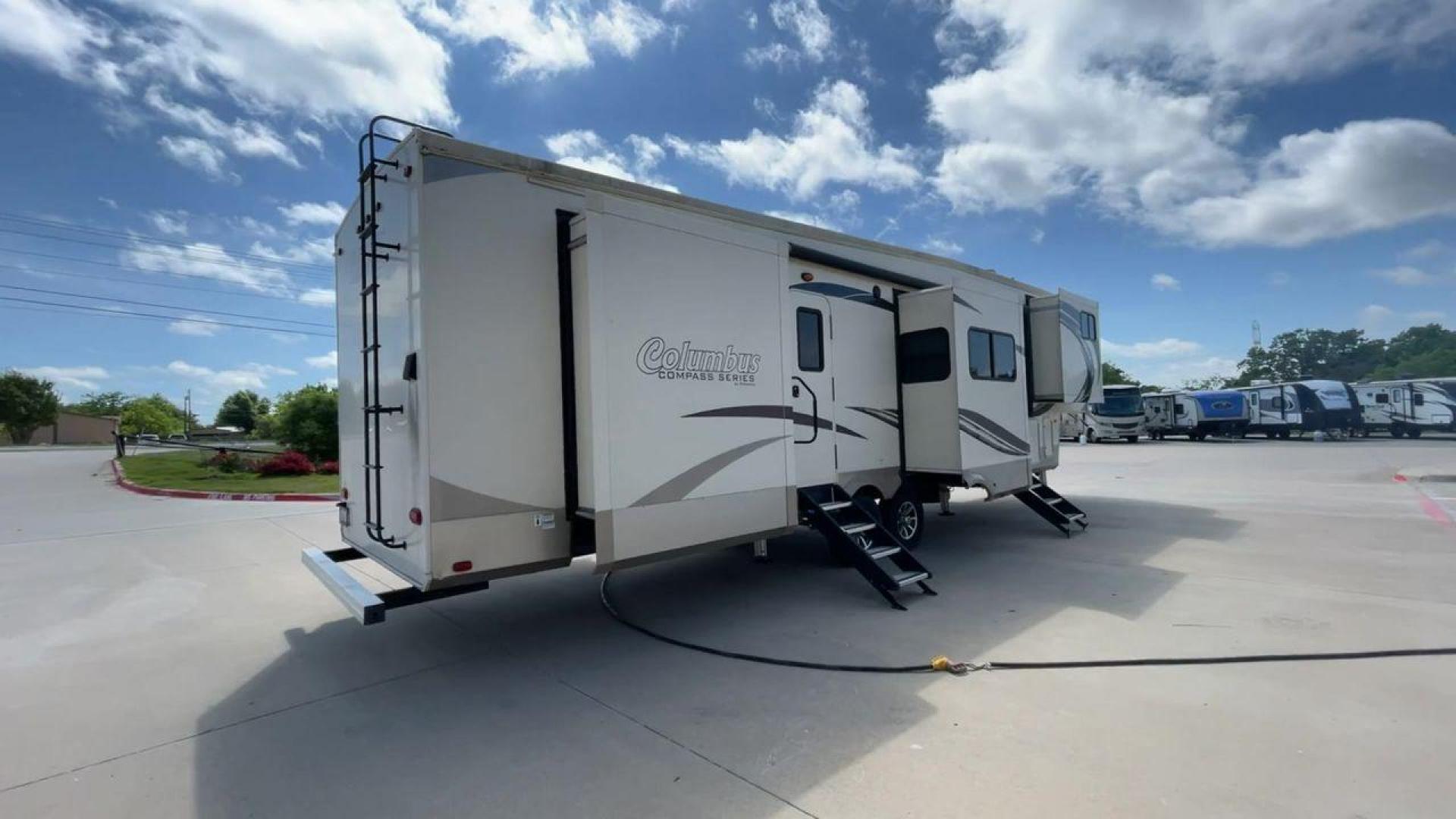 2018 FOREST RIVER COLUMBUS 386FKC (4X4FCMR20J6) , Length: 42.08 ft | Dry Weight: 12,272 lbs | Gross Weight: 15,272 lbs | Slides: 5 transmission, located at 4319 N Main St, Cleburne, TX, 76033, (817) 678-5133, 32.385960, -97.391212 - Photo#1