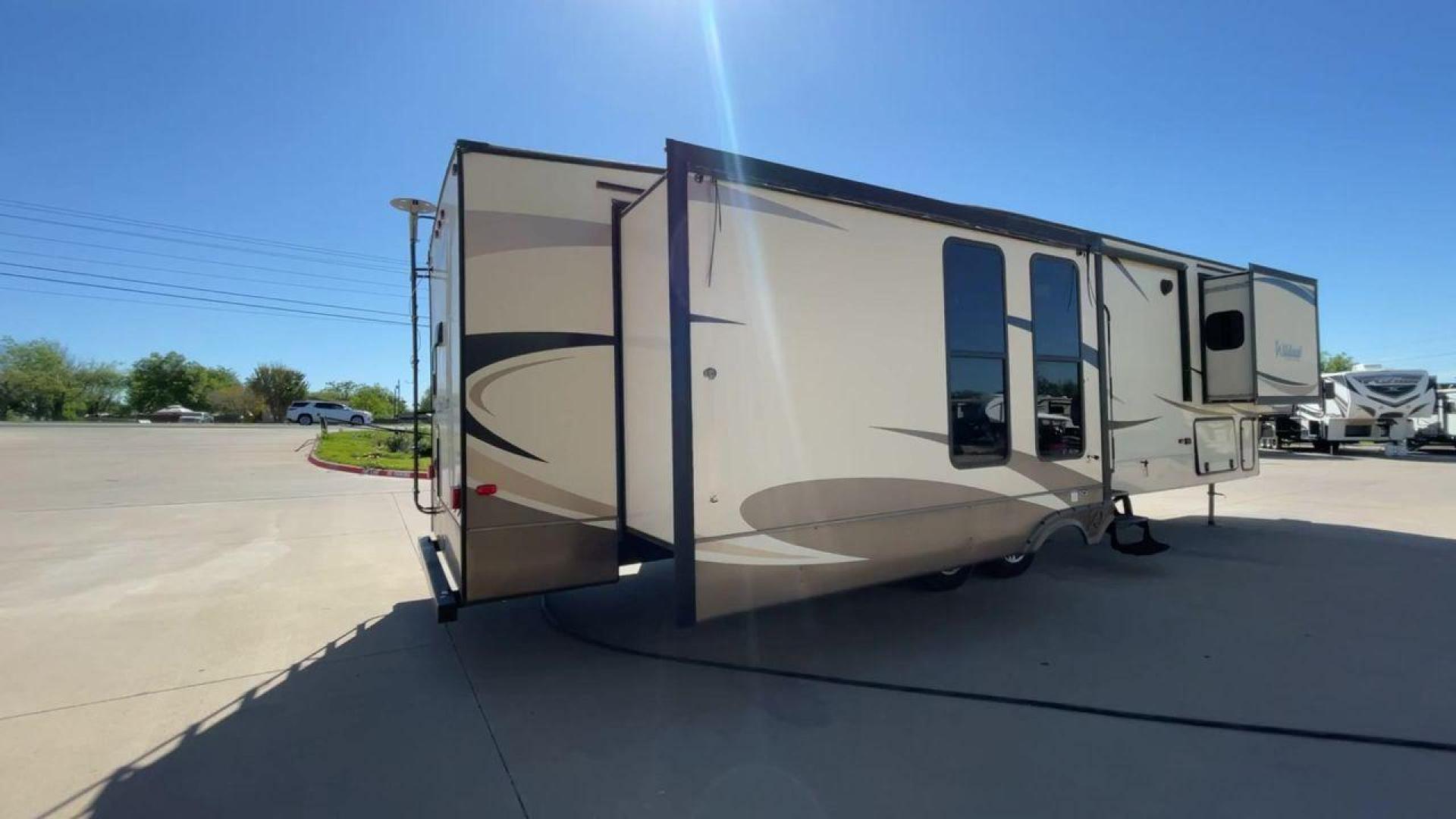 2018 TAN FOREST RIVER WILDCAT 37WB (5ZT3WC2BXJG) , located at 4319 N Main St, Cleburne, TX, 76033, (817) 678-5133, 32.385960, -97.391212 - Photo#1