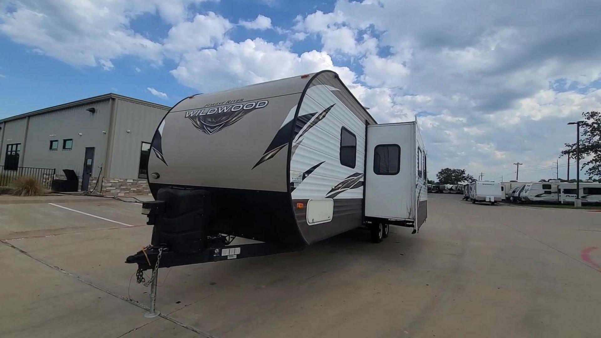 2018 FOREST RIVER WILDWOOD 28DBUD (4X4TWDD24JA) , Length: 29.5 ft. | Dry Weight: 6,223 lbs. | Slides: 1 transmission, located at 4319 N Main St, Cleburne, TX, 76033, (817) 678-5133, 32.385960, -97.391212 - With the 2018 Forest River Wildwood 28DBUD travel trailer, you can make everlasting experiences. This RV is a great option for families and adventurers looking for the ideal combination of amenities for an amazing camping trip. It is thoughtfully designed for comfort and convenience. The dimensio - Photo#3