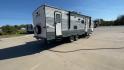 2018 GRAY GULF STREAM CONQUEST 268BH (1NL1G302XJ1) , Length: 29.5 ft. | Dry Weight: 5,220 lbs. | Slides: 1 transmission, located at 4319 N Main St, Cleburne, TX, 76033, (817) 678-5133, 32.385960, -97.391212 - This 2018 Gulf Stream Travel Trailer measures 29.5 feet long and 8 feet wide with a dry weight of 5,220 lbs. It has a payload capacity of 2,483 lbs. and a hitch weight of 660 lbs. It also comes equipped with automatic heating and cooling rated at 16,000 and 13,500 BTUs respectively. The exterior is - Photo#1