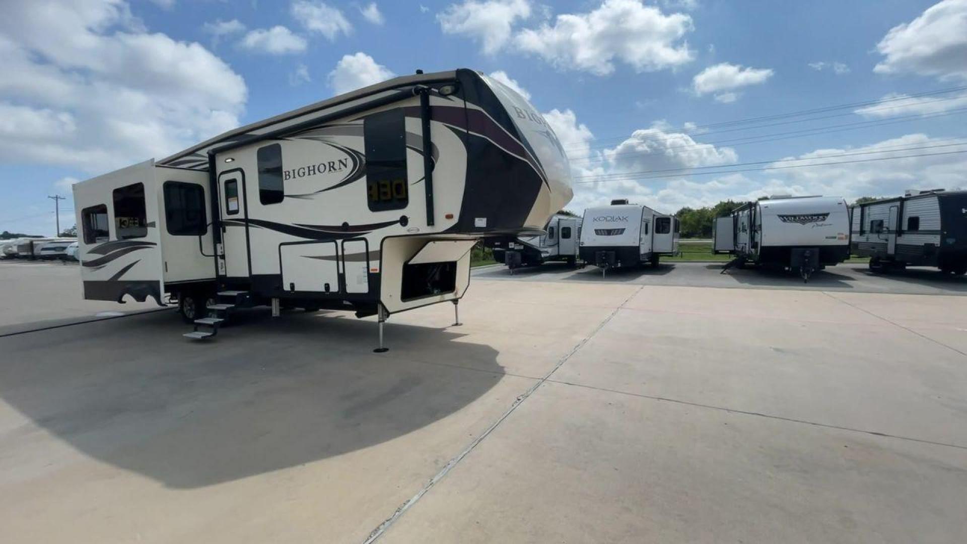 2018 HEARTLAND BIGHORN 3270RS (5SFBG3528JE) , Length: 35.2 ft. | Dry Weight: 11,965 lbs. | Gross Weight: 15,500 lbs. | Slides: 3 transmission, located at 4319 N Main St, Cleburne, TX, 76033, (817) 678-5133, 32.385960, -97.391212 - The 2018 Heartland Bighorn 3270RS is a luxurious fifth wheel that is both spacious and elegant. It is designed to offer maximum comfort during extended trips. With a length of 35.2 feet and a dry weight of 11,965 lbs, this unit provides a well-balanced blend of sturdiness and ease of towing, with a - Photo#3