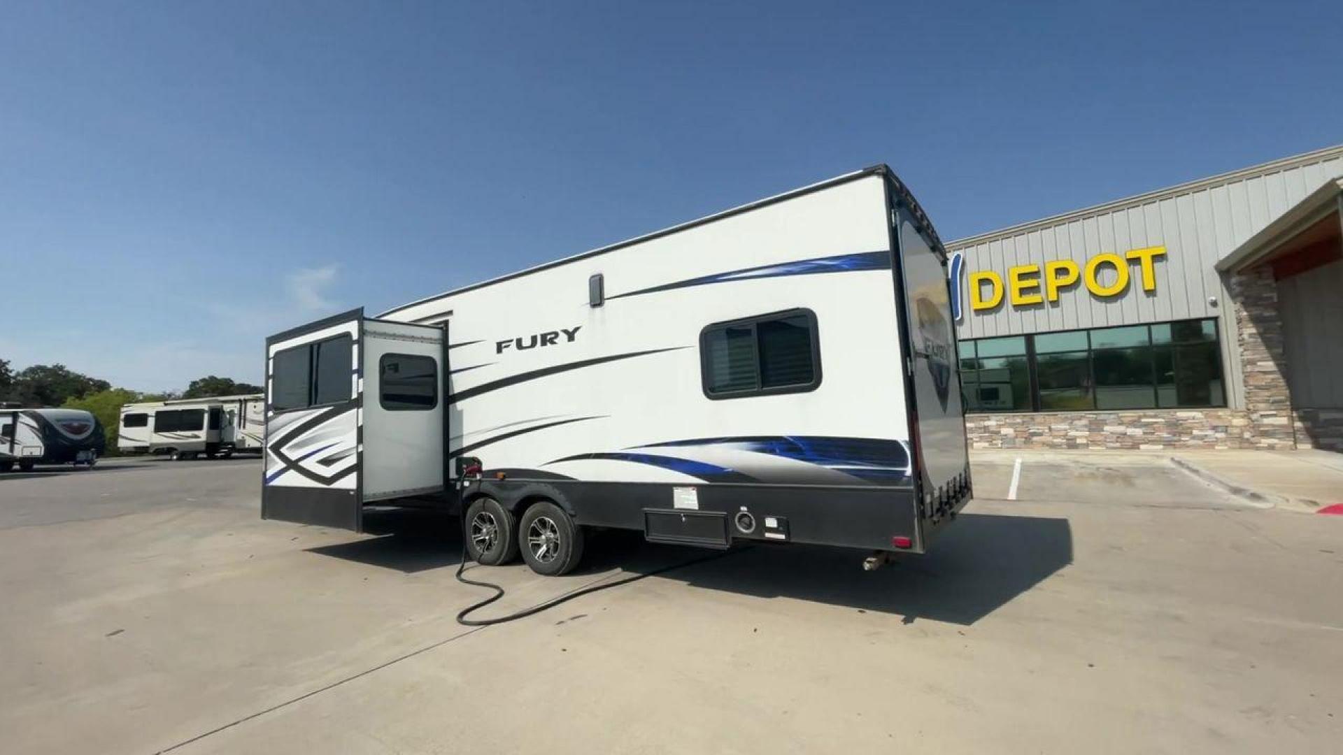 2018 GRAY HEARTLAND FURY 2910 (5ZT2FHUB2JG) , Length: 34.5 ft. | Dry Weight: 7,262 lbs. | Slides: 1 transmission, located at 4319 N Main St, Cleburne, TX, 76033, (817) 678-5133, 32.385960, -97.391212 - The 2018 Prime Time Fury 2910 is a rugged and versatile toy hauler that seamlessly blends functionality with comfort for the ultimate adventure on the road. Measuring 34.5 feet in length, this toy hauler boasts an innovative design catered to the needs of outdoor enthusiasts. The Fury 2910 features - Photo#1