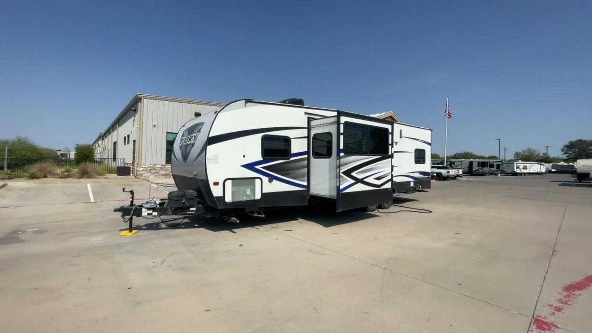 2018 GRAY HEARTLAND FURY 2910 (5ZT2FHUB2JG) , Length: 34.5 ft. | Dry Weight: 7,262 lbs. | Slides: 1 transmission, located at 4319 N Main St, Cleburne, TX, 76033, (817) 678-5133, 32.385960, -97.391212 - The 2018 Prime Time Fury 2910 is a rugged and versatile toy hauler that seamlessly blends functionality with comfort for the ultimate adventure on the road. Measuring 34.5 feet in length, this toy hauler boasts an innovative design catered to the needs of outdoor enthusiasts. The Fury 2910 features - Photo#3