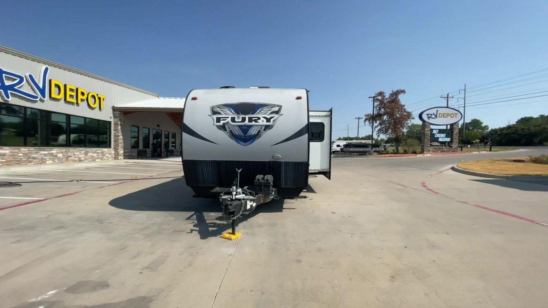 2018 GRAY HEARTLAND FURY 2910 (5ZT2FHUB2JG) , Length: 34.5 ft. | Dry Weight: 7,262 lbs. | Slides: 1 transmission, located at 4319 N Main St, Cleburne, TX, 76033, (817) 678-5133, 32.385960, -97.391212 - The 2018 Prime Time Fury 2910 is a rugged and versatile toy hauler that seamlessly blends functionality with comfort for the ultimate adventure on the road. Measuring 34.5 feet in length, this toy hauler boasts an innovative design catered to the needs of outdoor enthusiasts. The Fury 2910 features - Photo#4