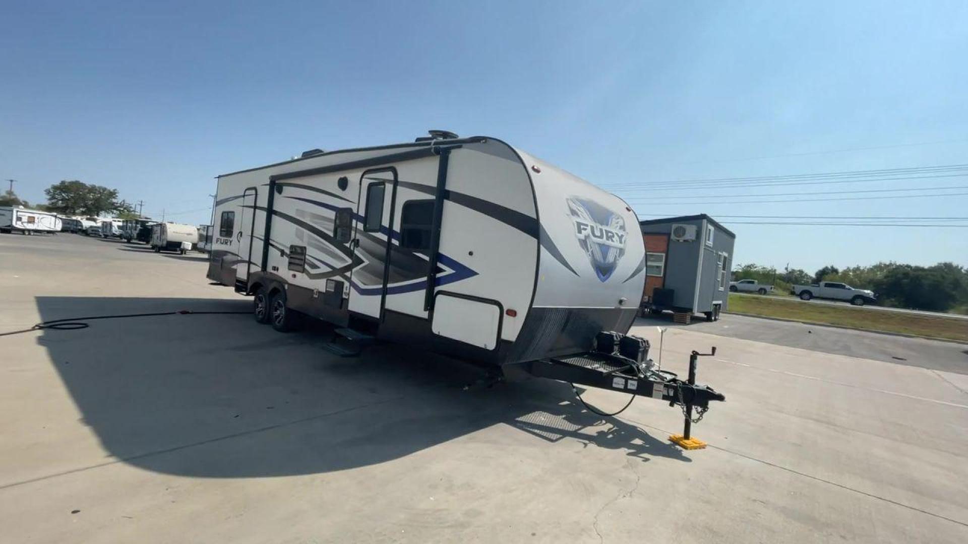 2018 GRAY HEARTLAND FURY 2910 (5ZT2FHUB2JG) , Length: 34.5 ft. | Dry Weight: 7,262 lbs. | Slides: 1 transmission, located at 4319 N Main St, Cleburne, TX, 76033, (817) 678-5133, 32.385960, -97.391212 - The 2018 Prime Time Fury 2910 is a rugged and versatile toy hauler that seamlessly blends functionality with comfort for the ultimate adventure on the road. Measuring 34.5 feet in length, this toy hauler boasts an innovative design catered to the needs of outdoor enthusiasts. The Fury 2910 features - Photo#5