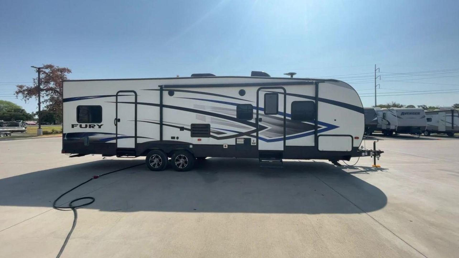 2018 GRAY HEARTLAND FURY 2910 (5ZT2FHUB2JG) , Length: 34.5 ft. | Dry Weight: 7,262 lbs. | Slides: 1 transmission, located at 4319 N Main St, Cleburne, TX, 76033, (817) 678-5133, 32.385960, -97.391212 - The 2018 Prime Time Fury 2910 is a rugged and versatile toy hauler that seamlessly blends functionality with comfort for the ultimate adventure on the road. Measuring 34.5 feet in length, this toy hauler boasts an innovative design catered to the needs of outdoor enthusiasts. The Fury 2910 features - Photo#6