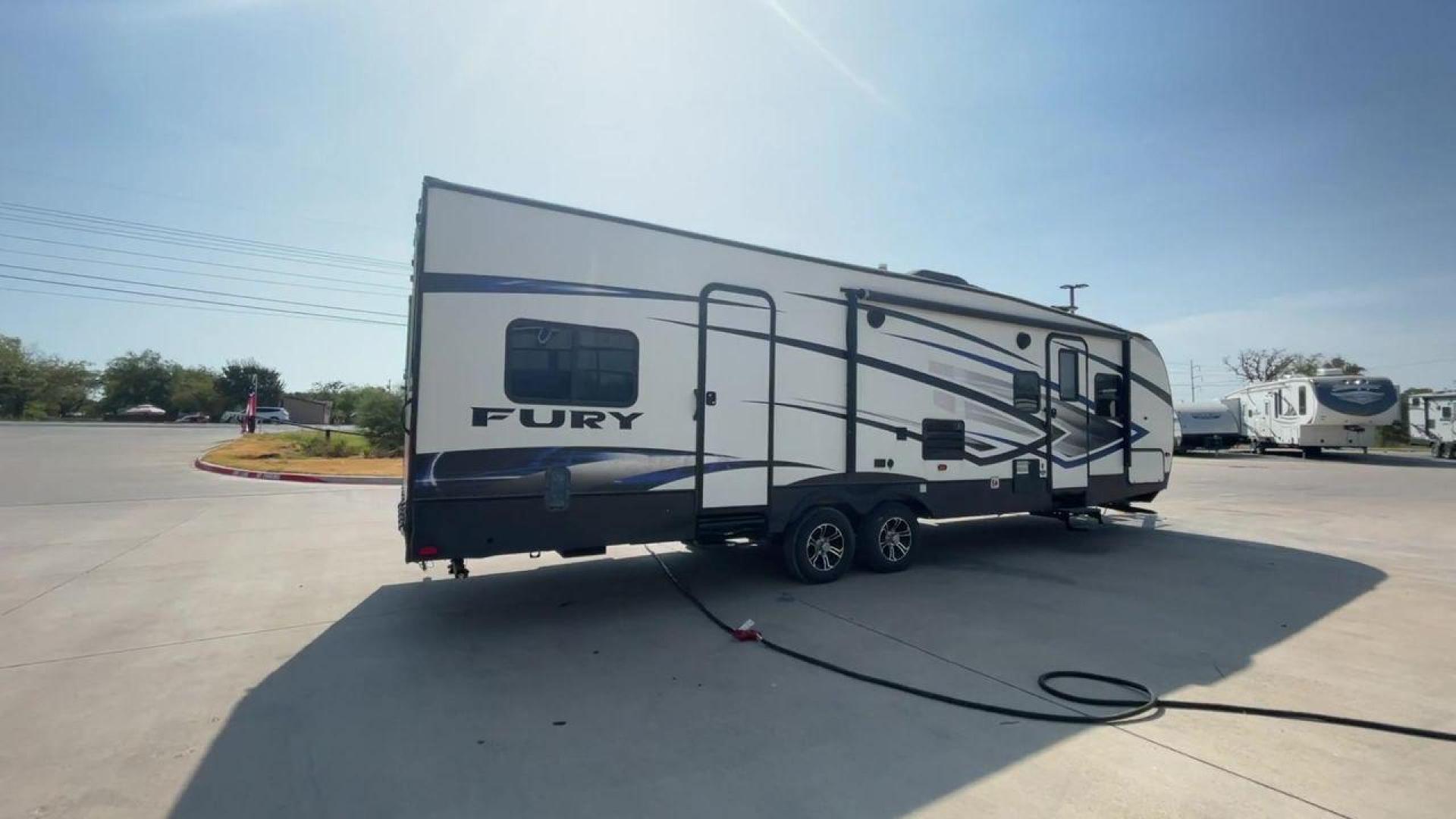 2018 GRAY HEARTLAND FURY 2910 (5ZT2FHUB2JG) , Length: 34.5 ft. | Dry Weight: 7,262 lbs. | Slides: 1 transmission, located at 4319 N Main St, Cleburne, TX, 76033, (817) 678-5133, 32.385960, -97.391212 - The 2018 Prime Time Fury 2910 is a rugged and versatile toy hauler that seamlessly blends functionality with comfort for the ultimate adventure on the road. Measuring 34.5 feet in length, this toy hauler boasts an innovative design catered to the needs of outdoor enthusiasts. The Fury 2910 features - Photo#7