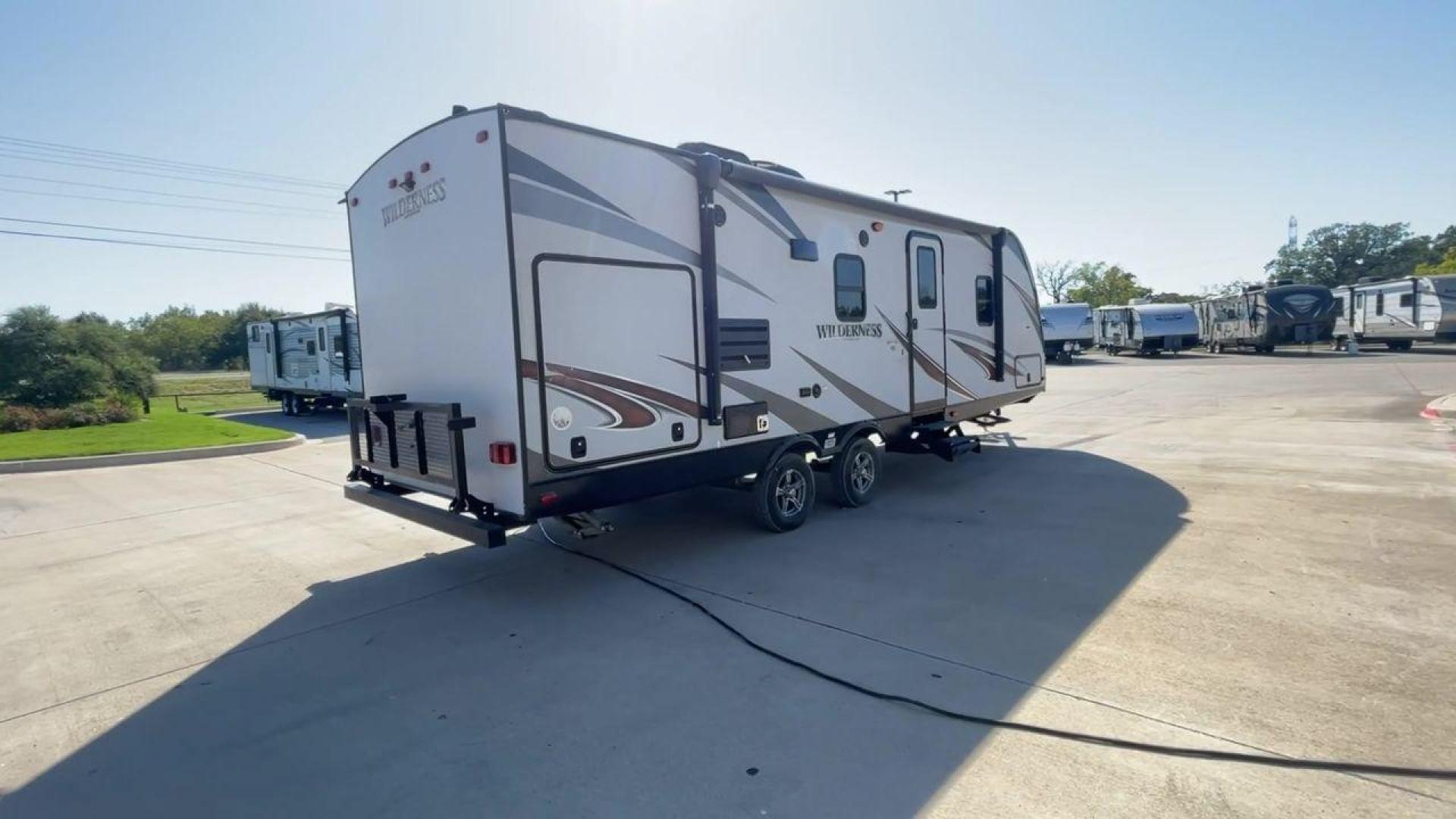 2018 HEARTLAND WILDERNESS 2450FB (5SFNB3022JN) , Length: 30.33 ft. | Dry Weight: 5,433 lbs. | Gross Weight: 6,900 lbs. | Slides: 1 transmission, located at 4319 N Main St, Cleburne, TX, 76033, (817) 678-5133, 32.385960, -97.391212 - With the 2018 Heartland Recreation Wilderness 2450FB travel trailer, set out on an outdoor adventure. For those looking for an unforgettable camping experience, this well-designed RV offers the ideal home away from home thanks to its innovative design, comfort, and functionality. The dimensions of t - Photo#1